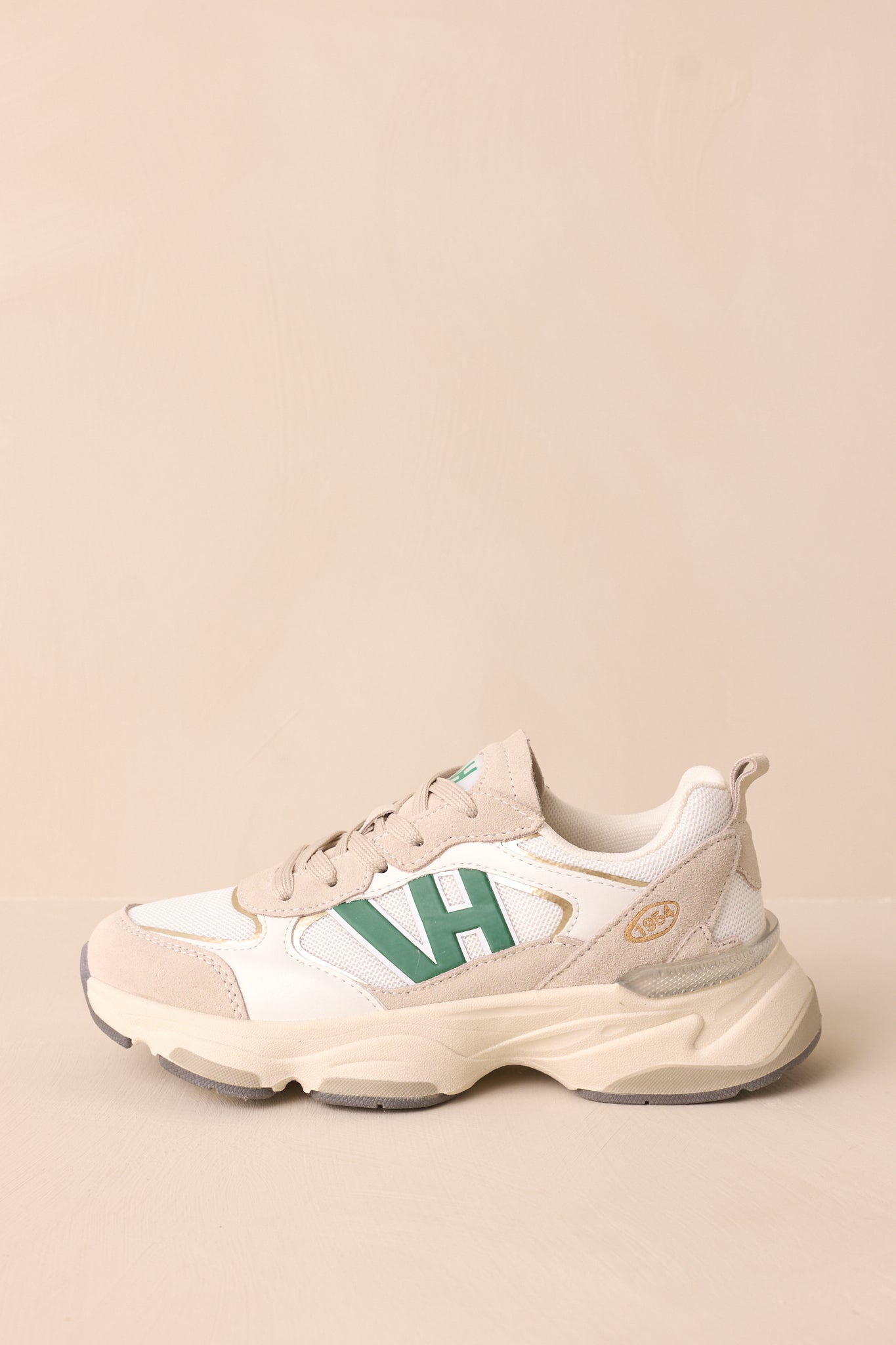 Stylish green sneakers with white and tan color blocking, a thick beige sole, and a bold green VH symbol on the sides.