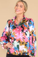 Front view of this top that showcases the multi-colored floral print.