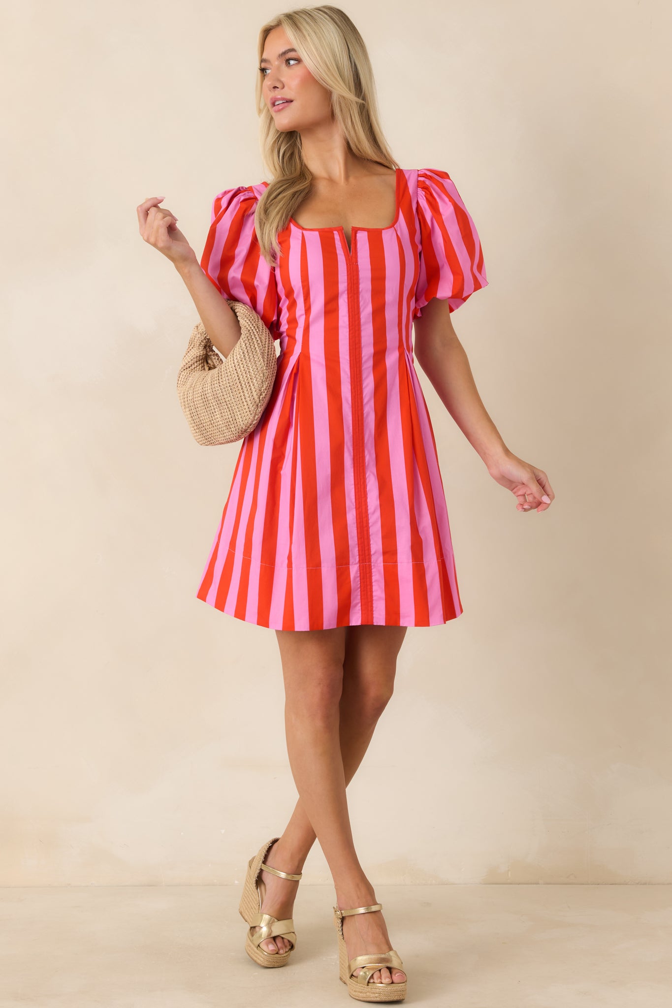 Flared mini dress with fitted waist and smooth silhouette in lightweight 100% cotton.