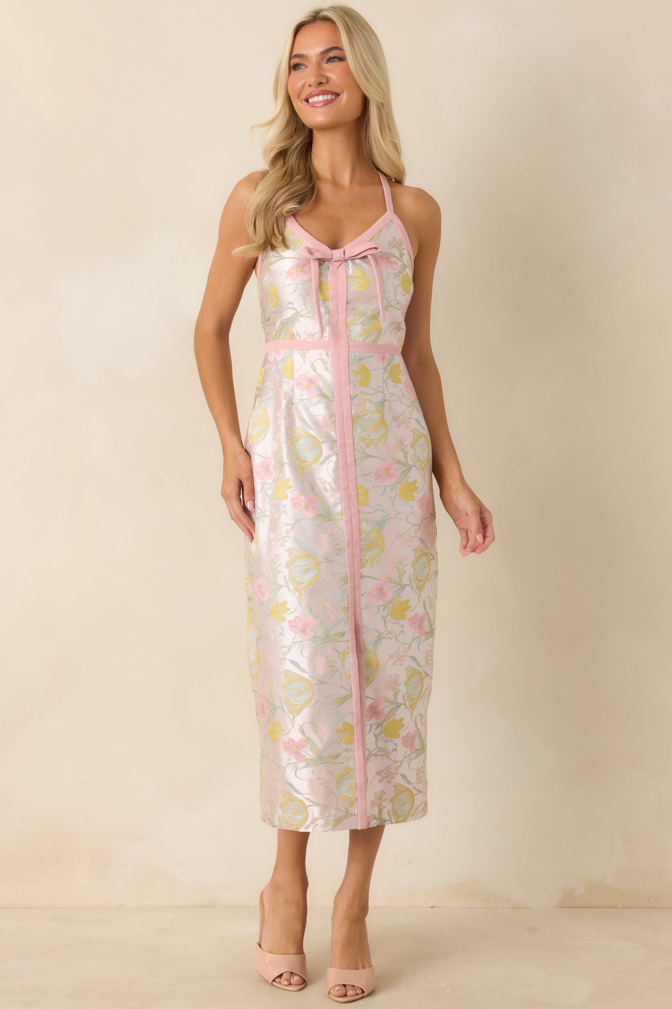 Shimmer floral midi dress designed with a textured jacquard pattern, delicate spaghetti straps, and a polished midi-length silhouette.