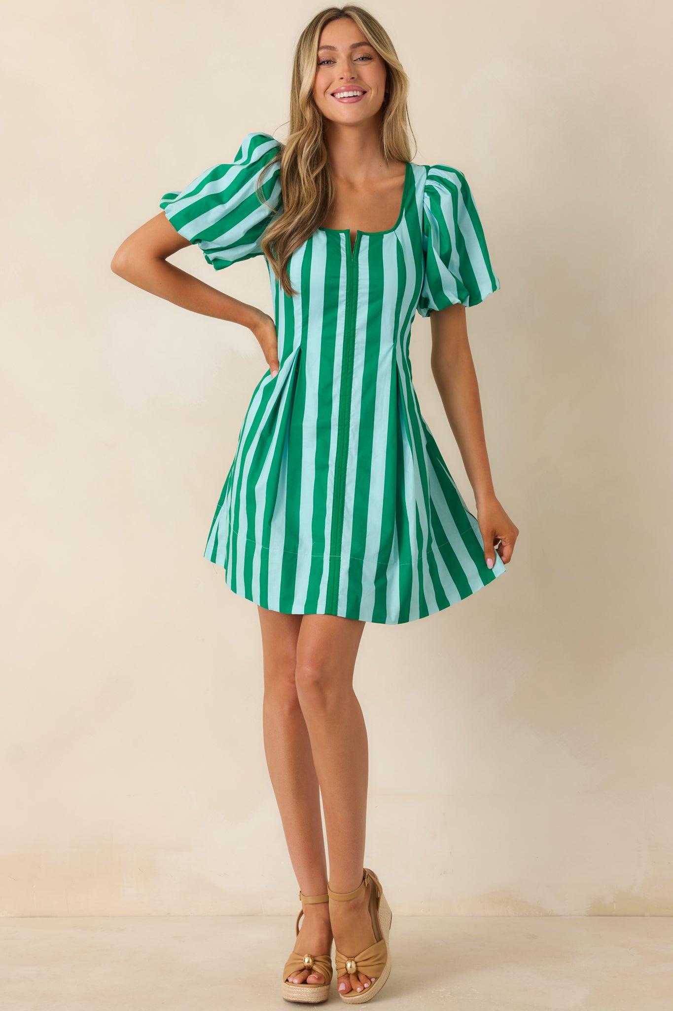 Square neck mini dress with puff sleeves and a tailored bodice designed in lightweight cotton with a clean, polished finish.