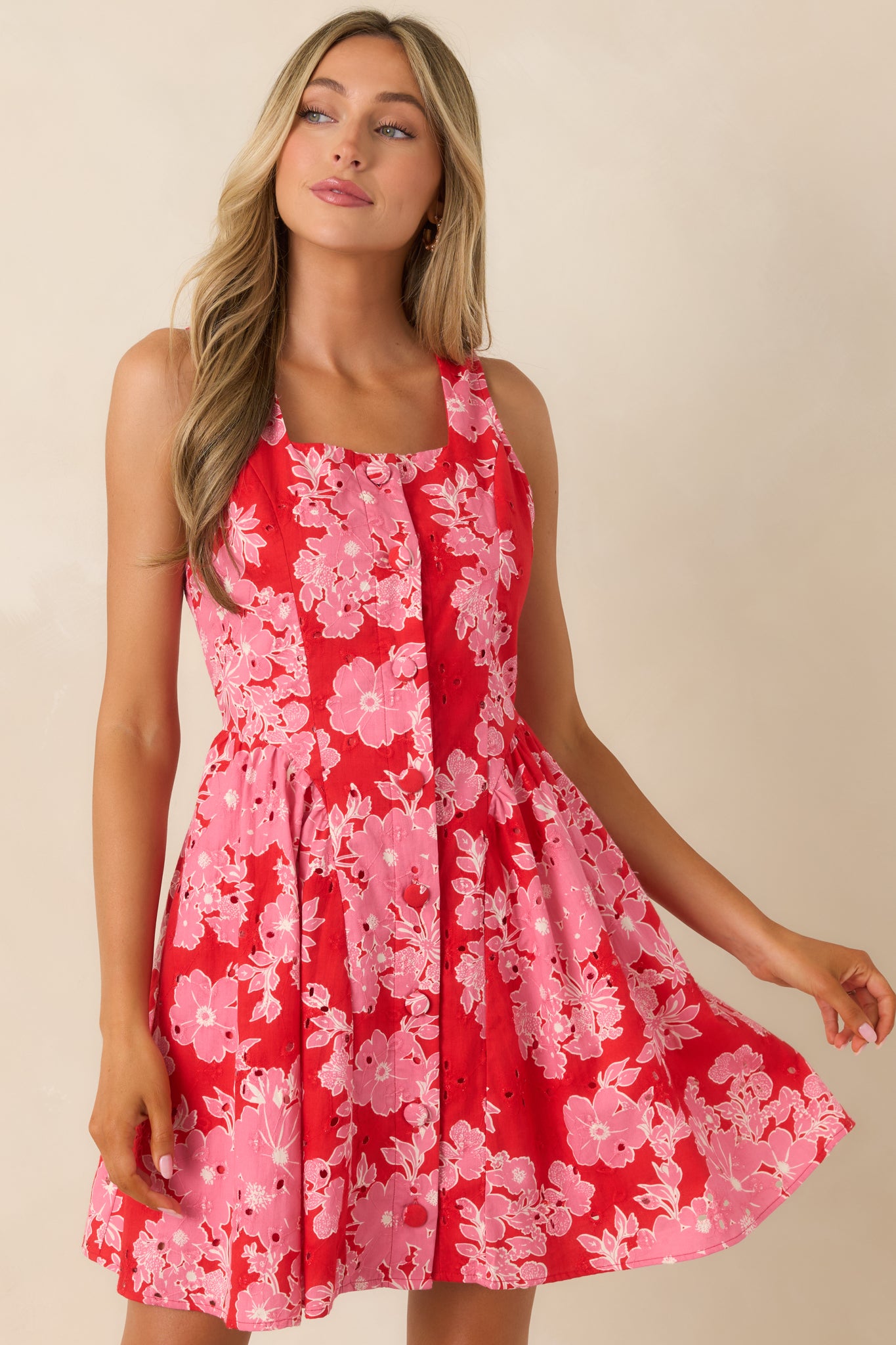 Cropped view of button-front mini dress with softly flared skirt shape.