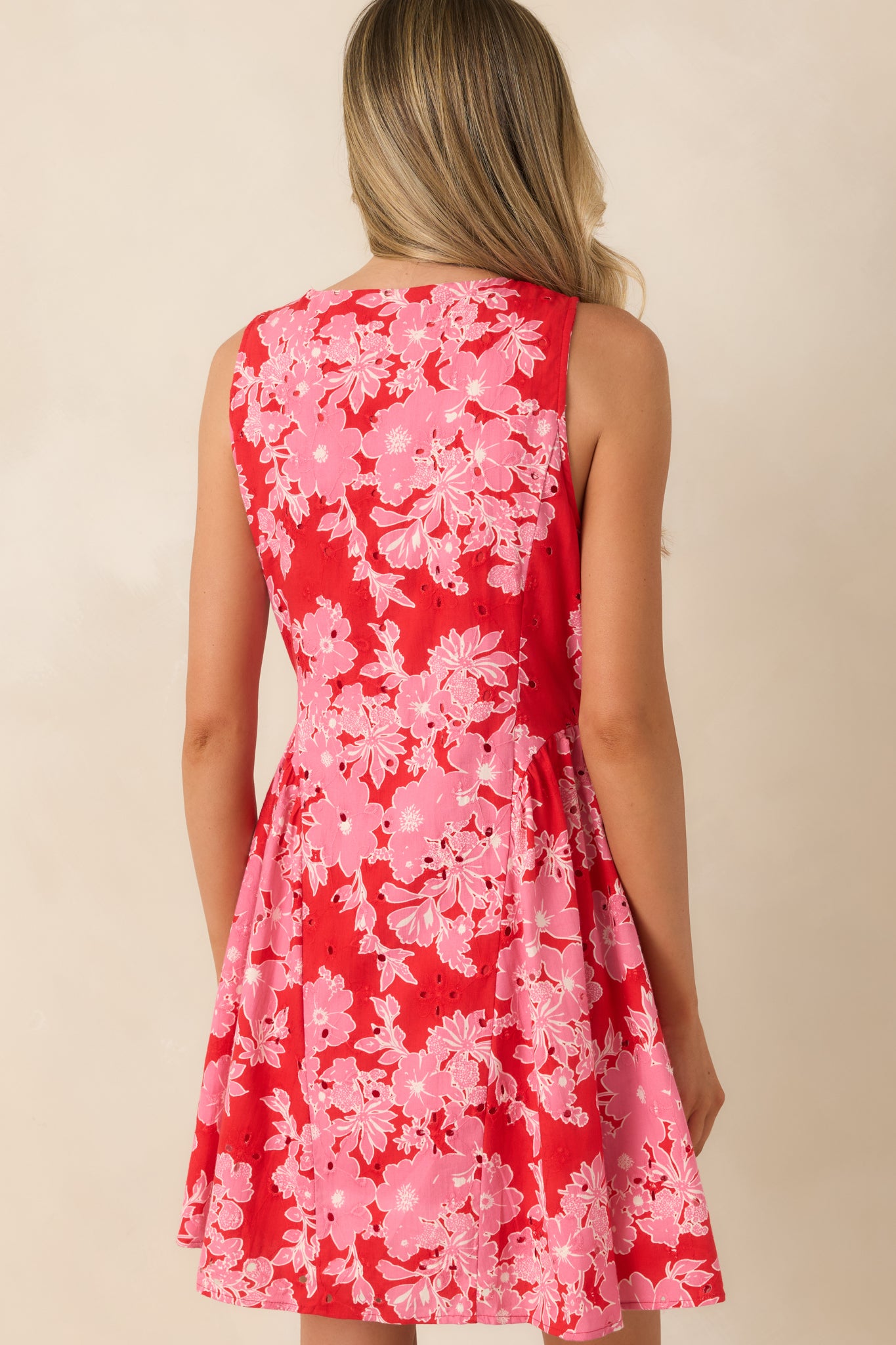 Rear view of mini dress with clean lines and softly flared skirt silhouette.