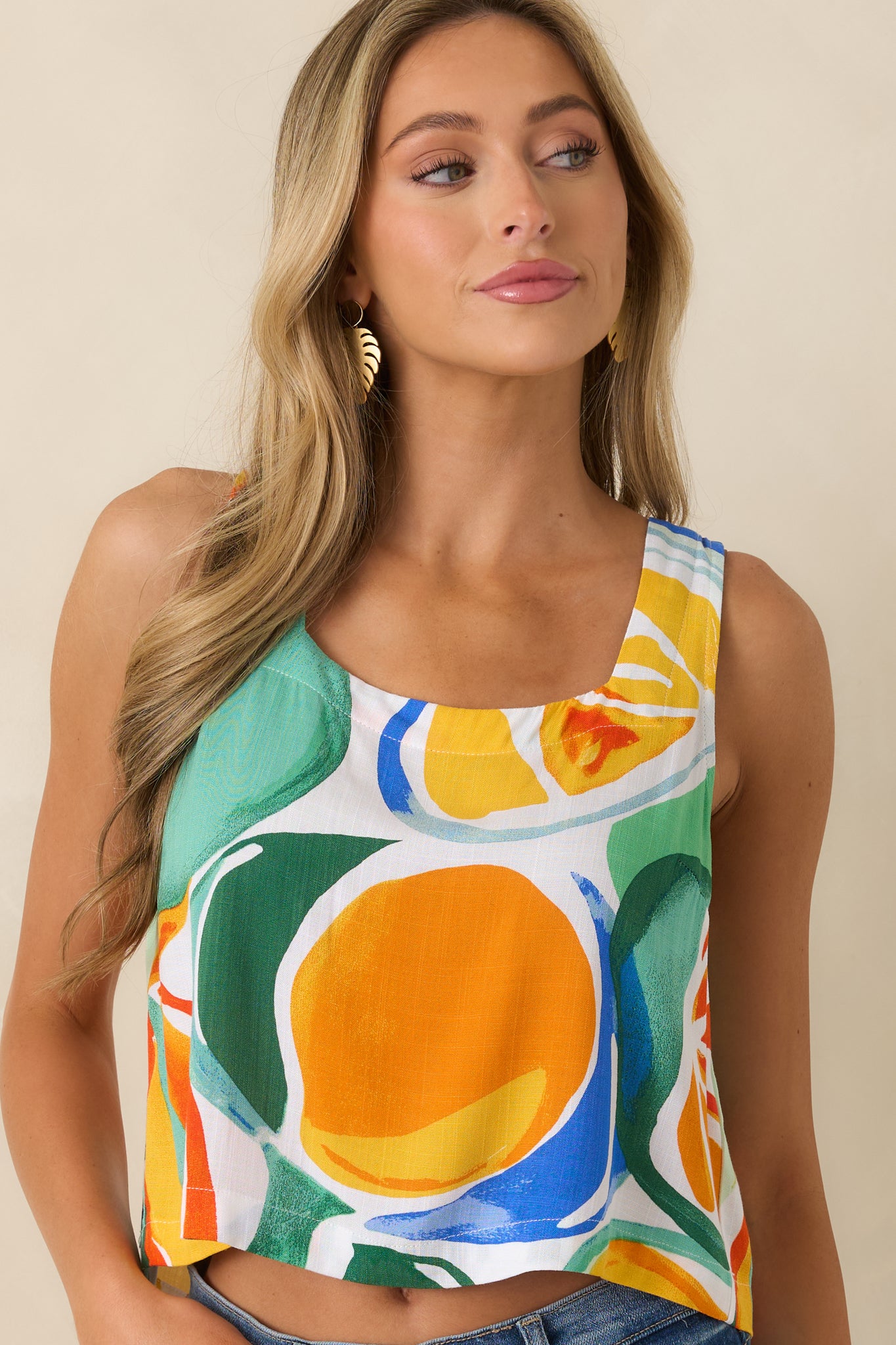 Cropped view highlighting the relaxed silhouette and lightweight woven fabric construction.