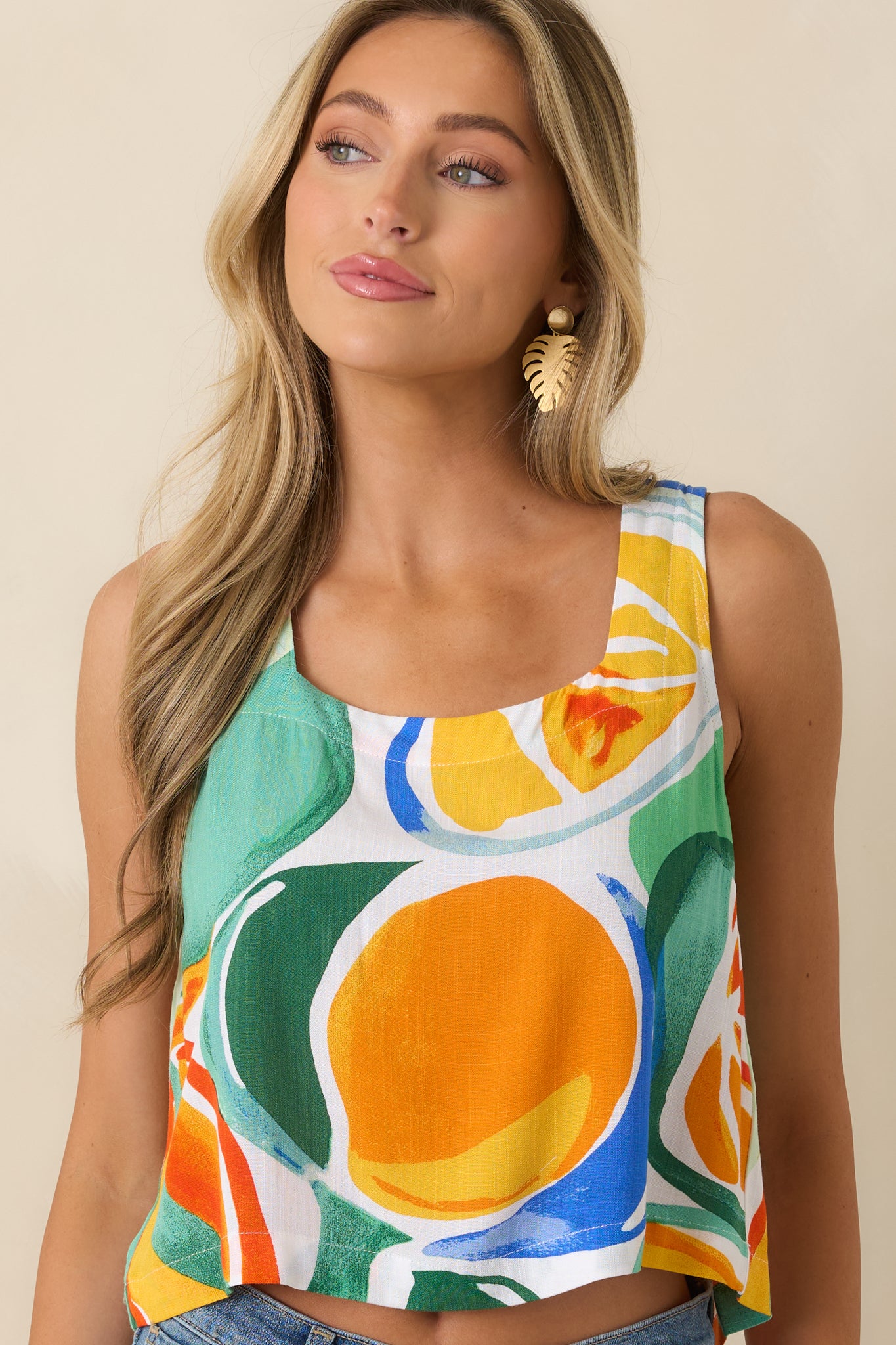 Multi-colored tank detail showcasing the clean neckline finish and smooth fabric drape.