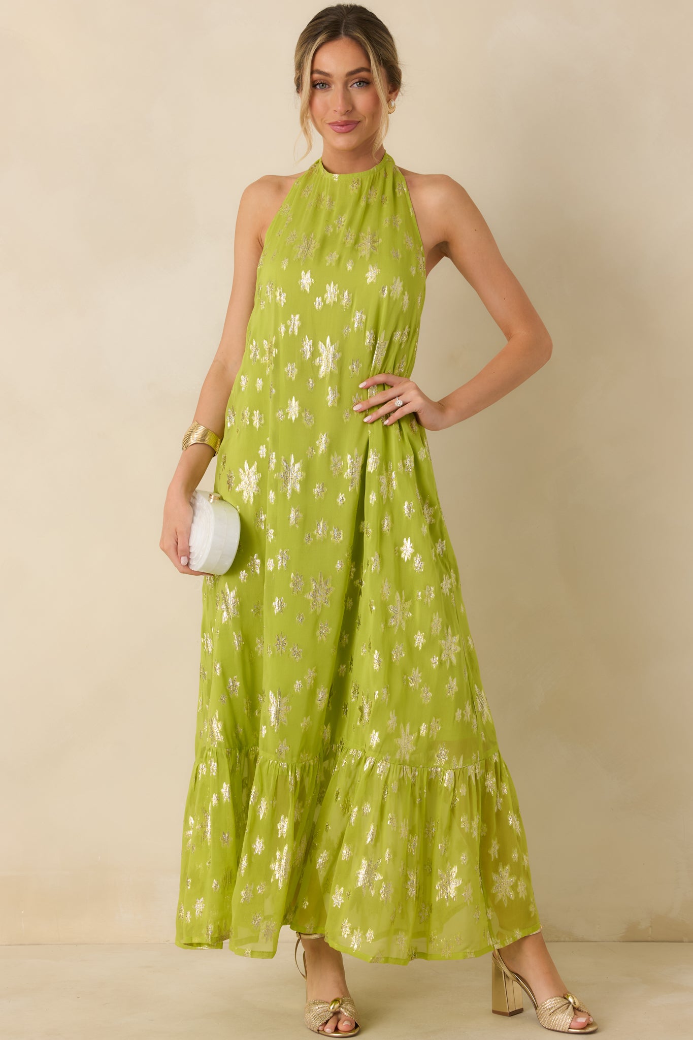 Chartreuse maxi dress in lightweight woven fabric with metallic floral detailing and a flowing tiered skirt.
