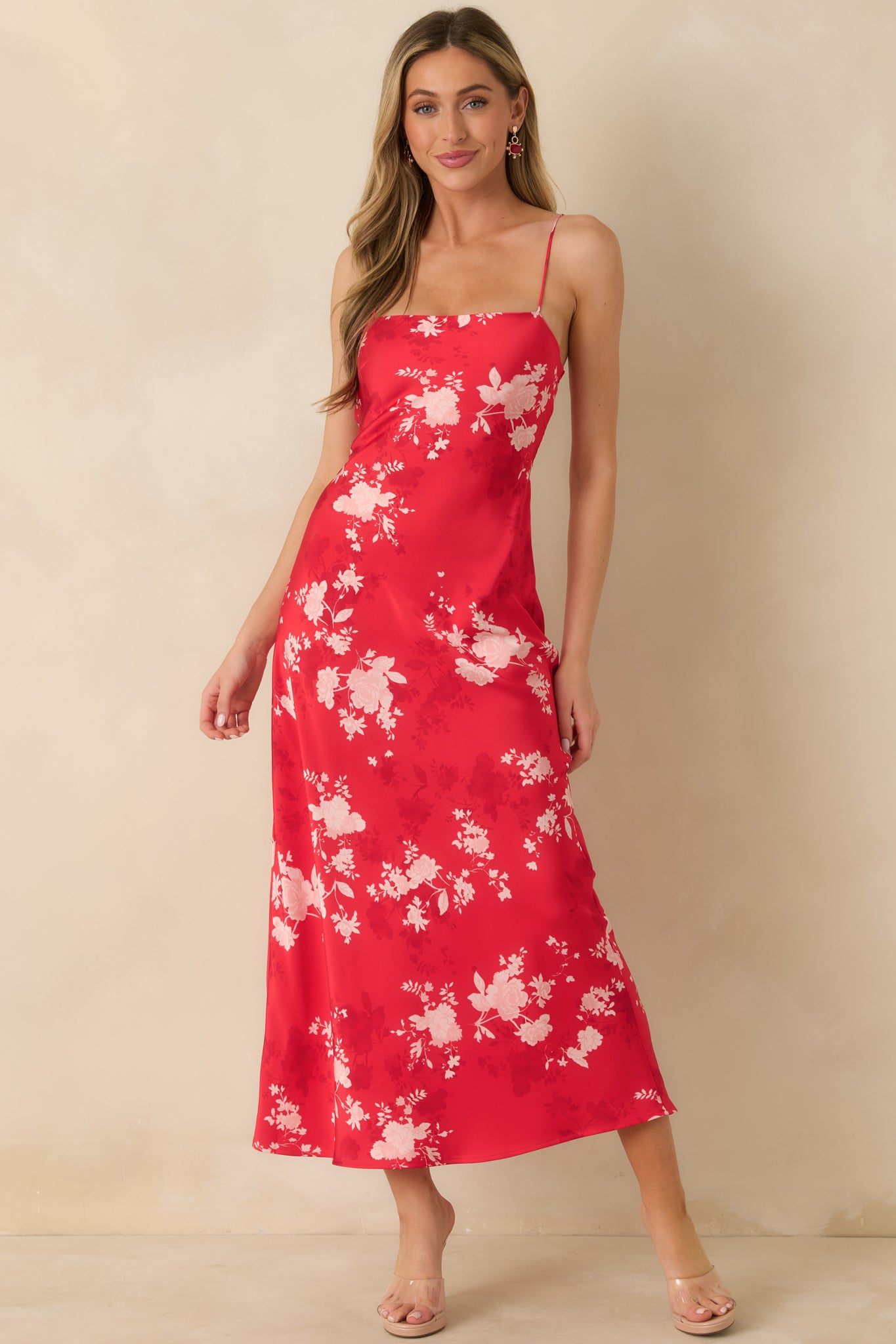 Red floral dress showcasing a flattering fitted bodice balanced by a softly draped maxi skirt.
