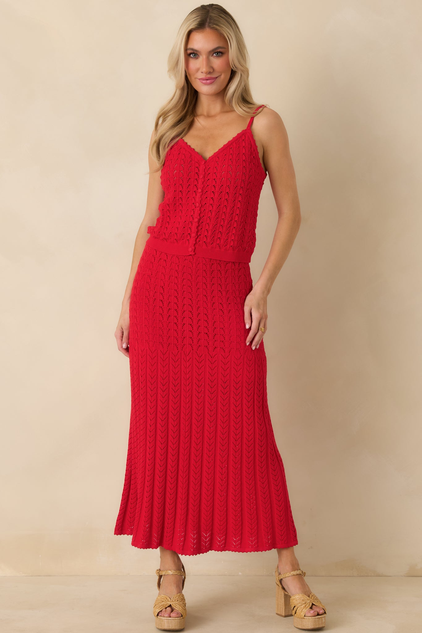 High-rise red midi sweater skirt showcasing soft structure and an easy, versatile shape.