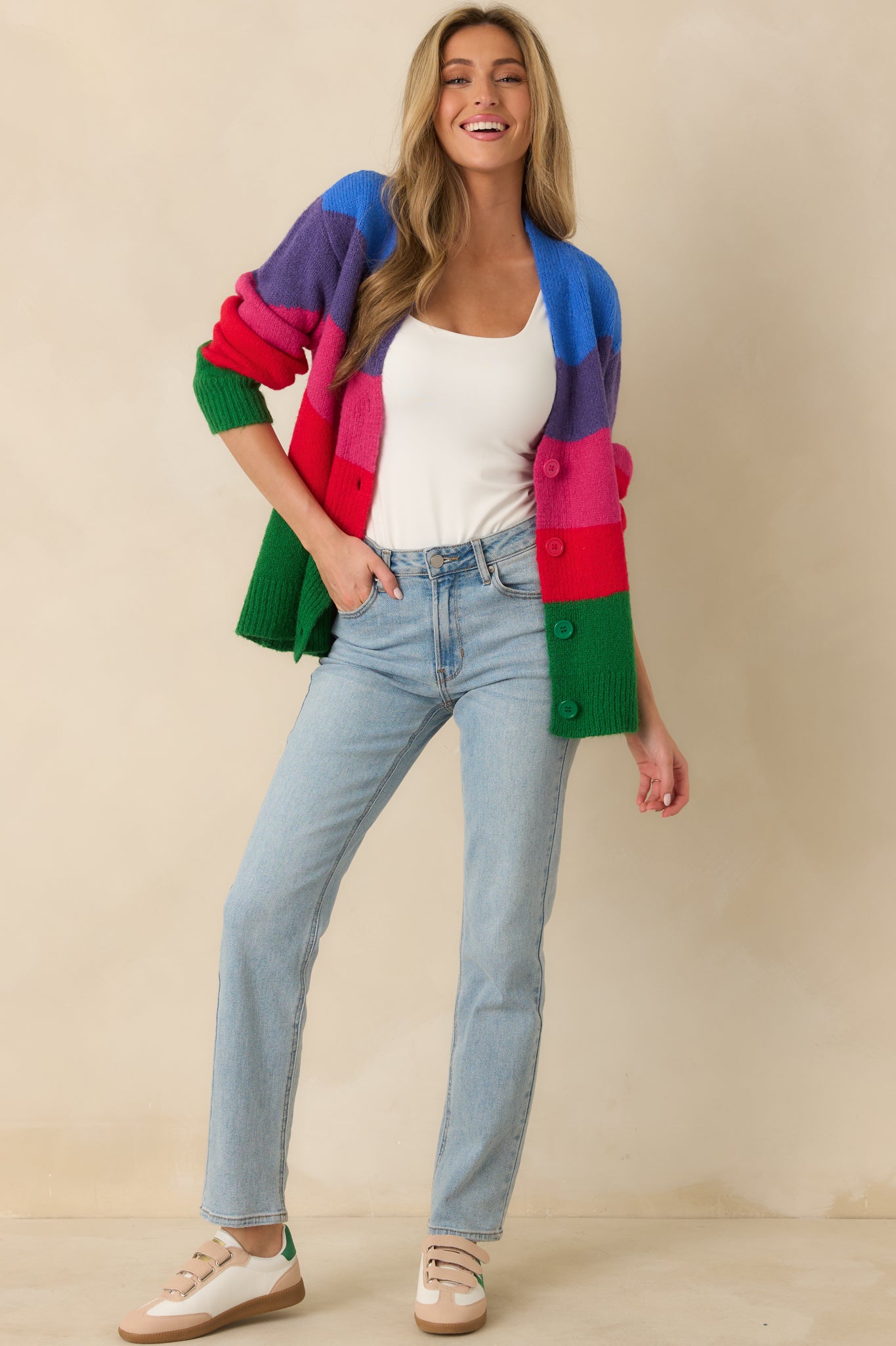 Colorblock cardigan designed for easy layering with ribbed hem and flattering shape.
