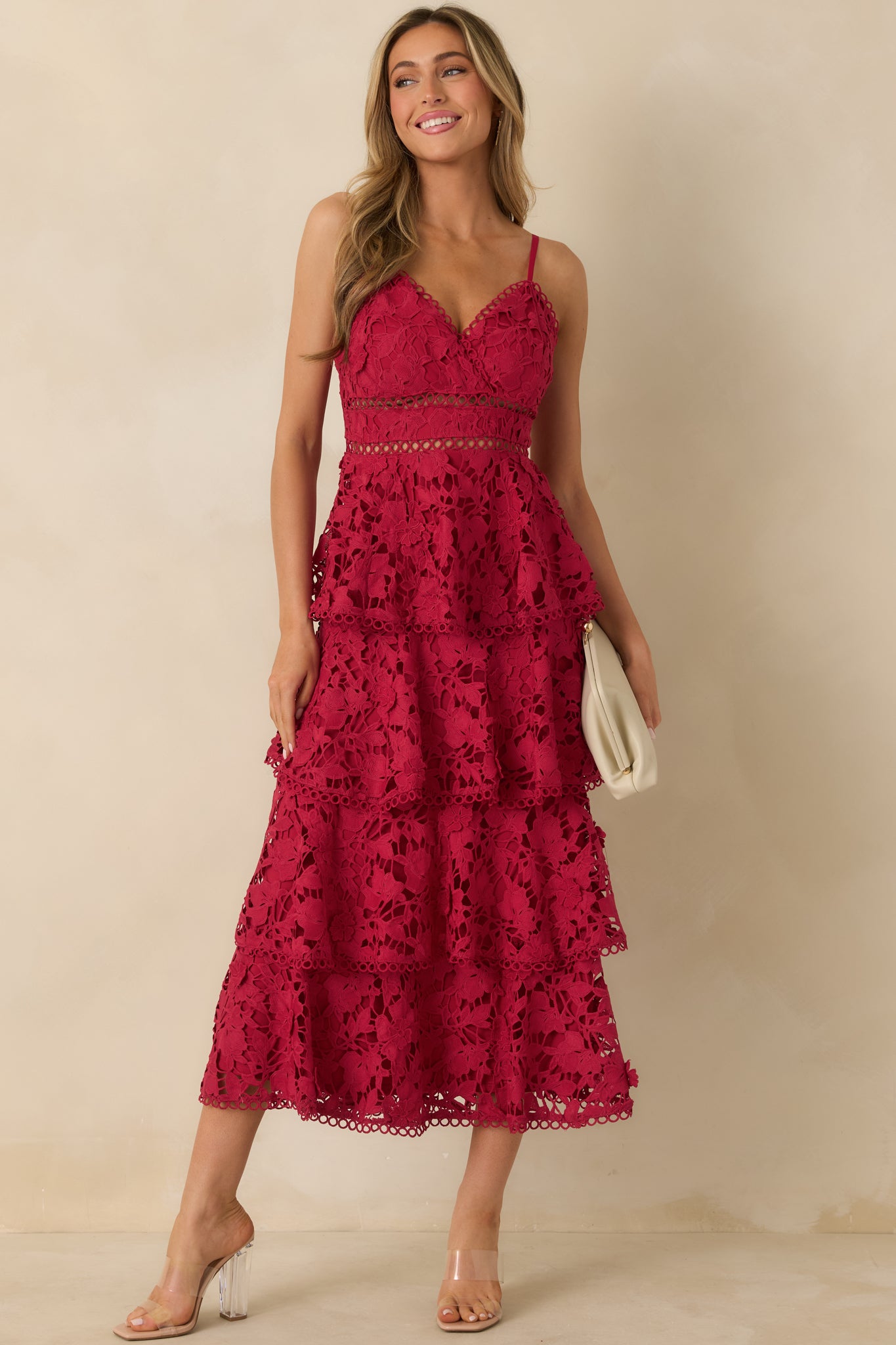 Red maxi dress with delicate floral lace overlay, lined base, and adjustable straps.