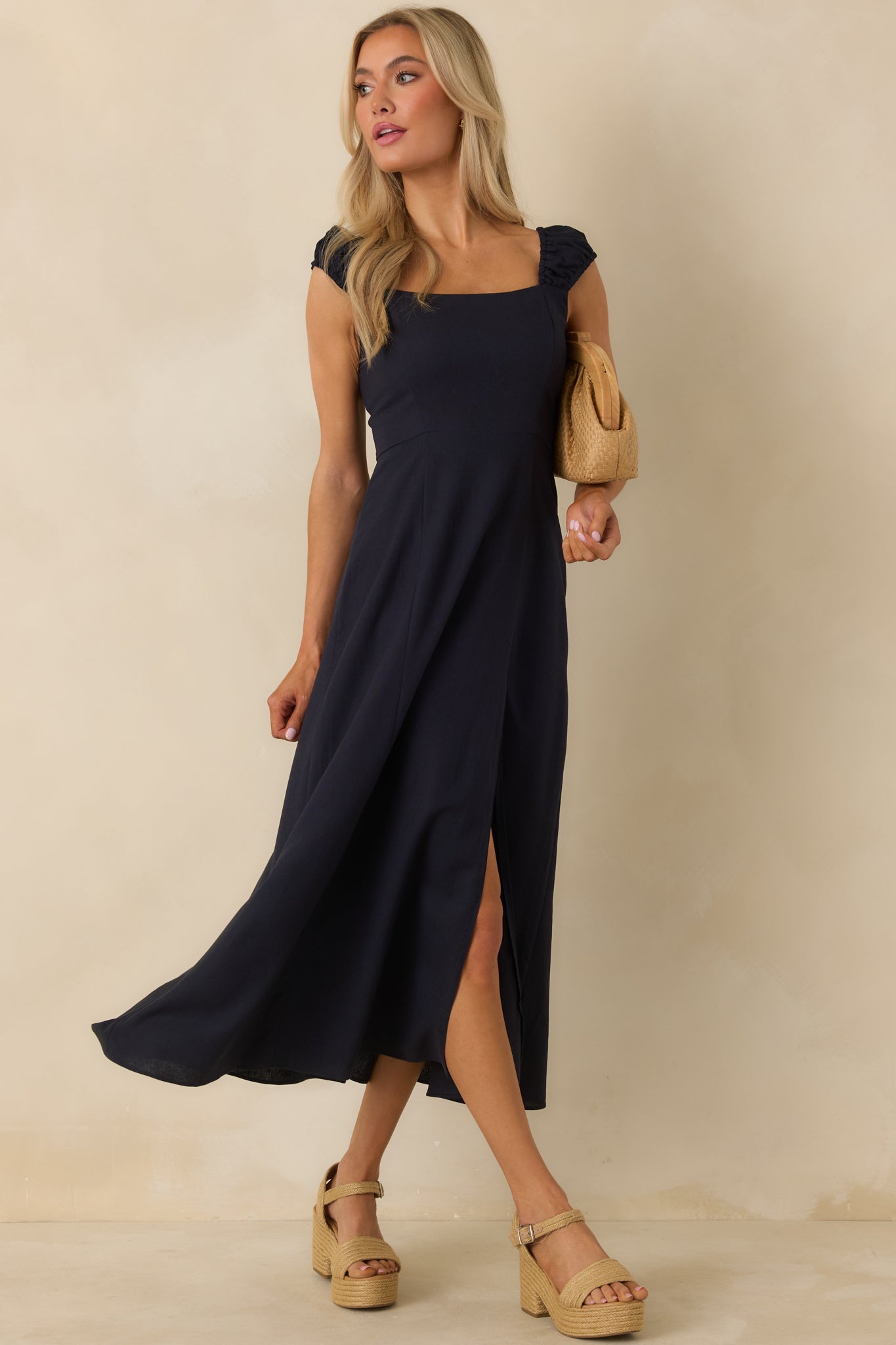 Front view showcasing the square neckline and clean waistline of the dress.