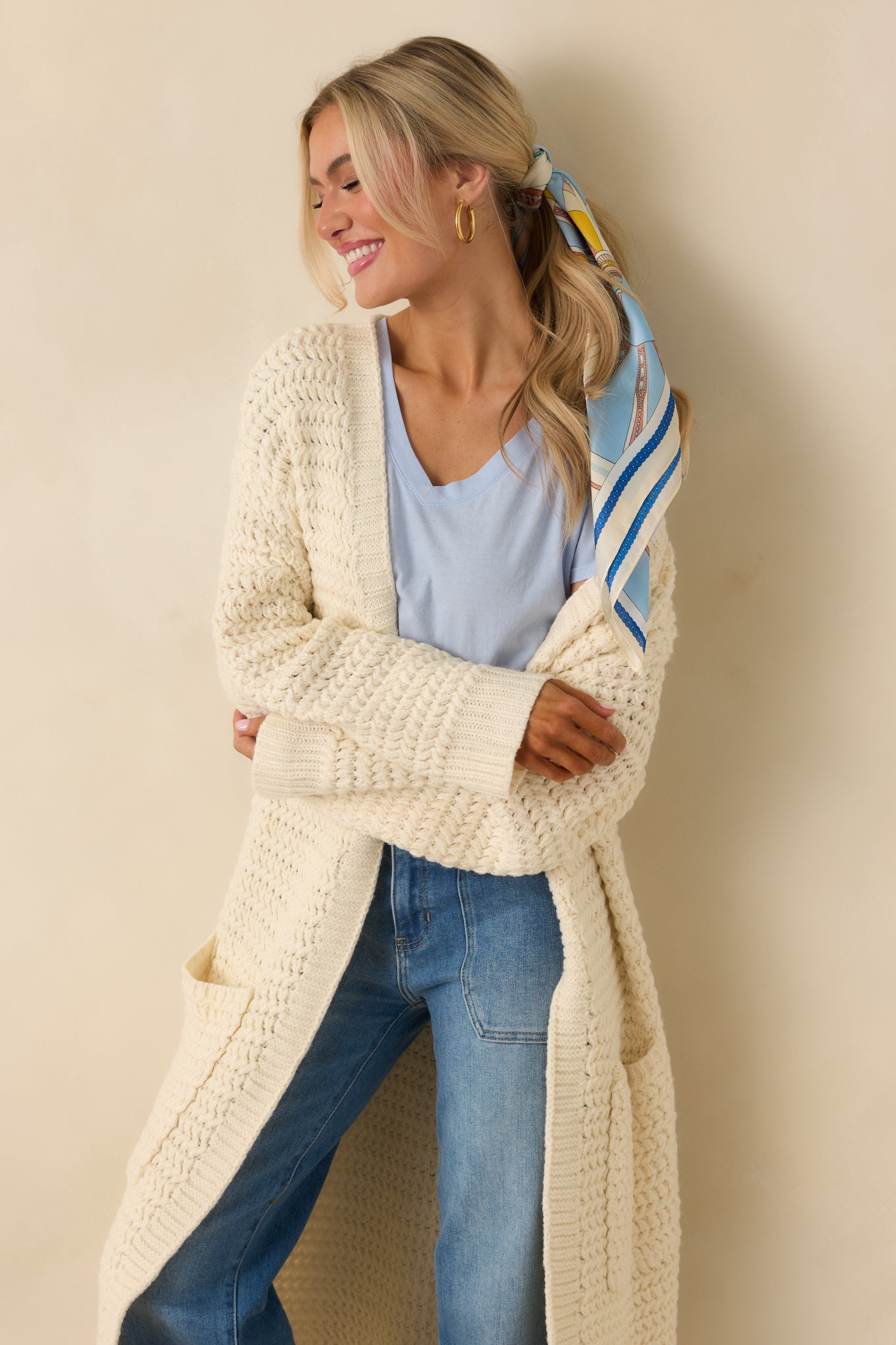 Close-up of the front patch pocket and knit texture.