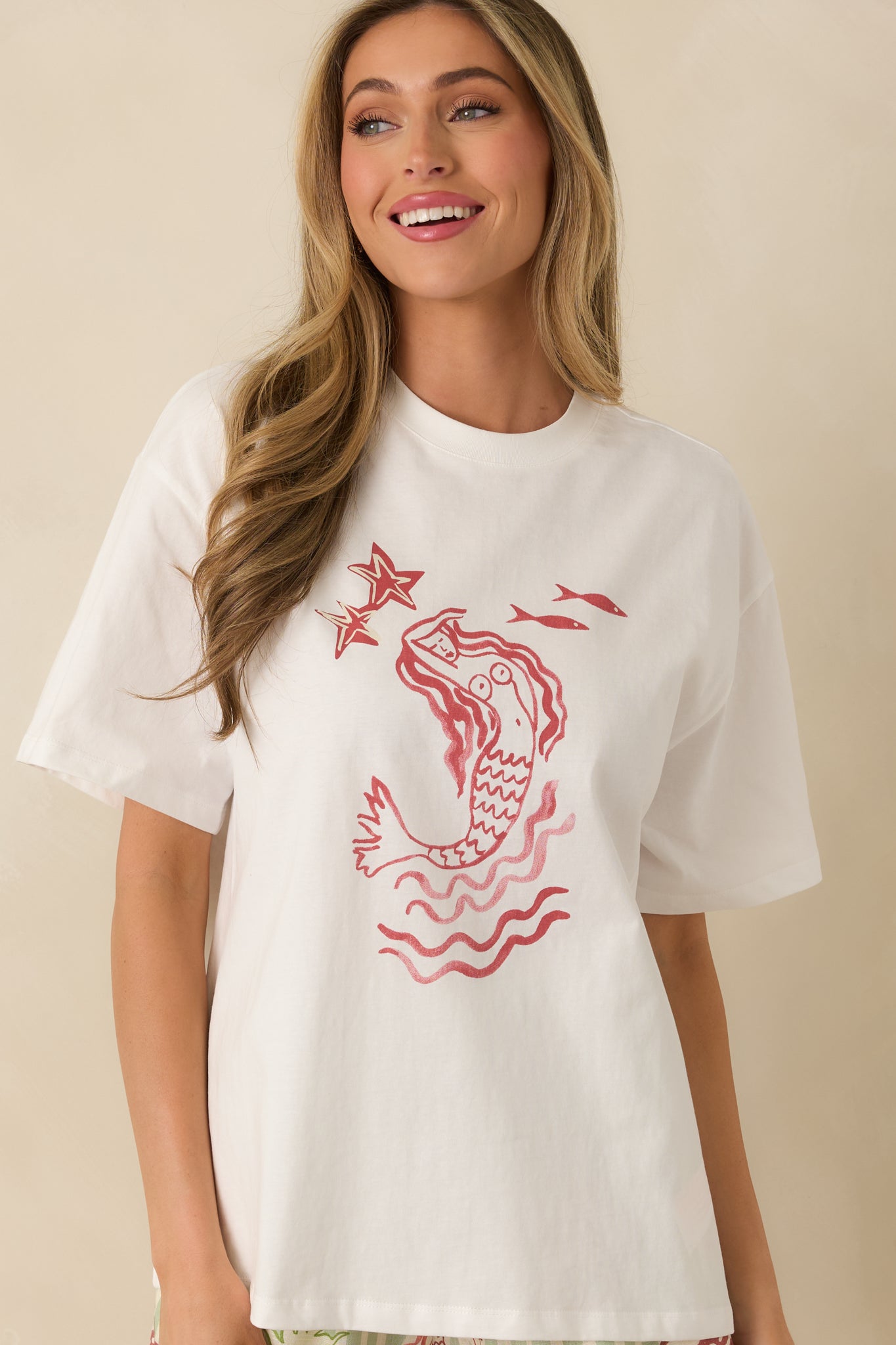 Close-cropped image showing the printed mermaid graphic detail on the front.