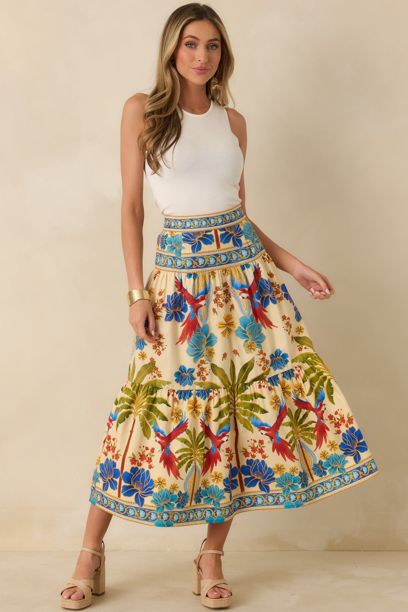 Front-facing view of multicolored maxi skirt showcasing high-rise waistband, tiered layers, and flowing silhouette.