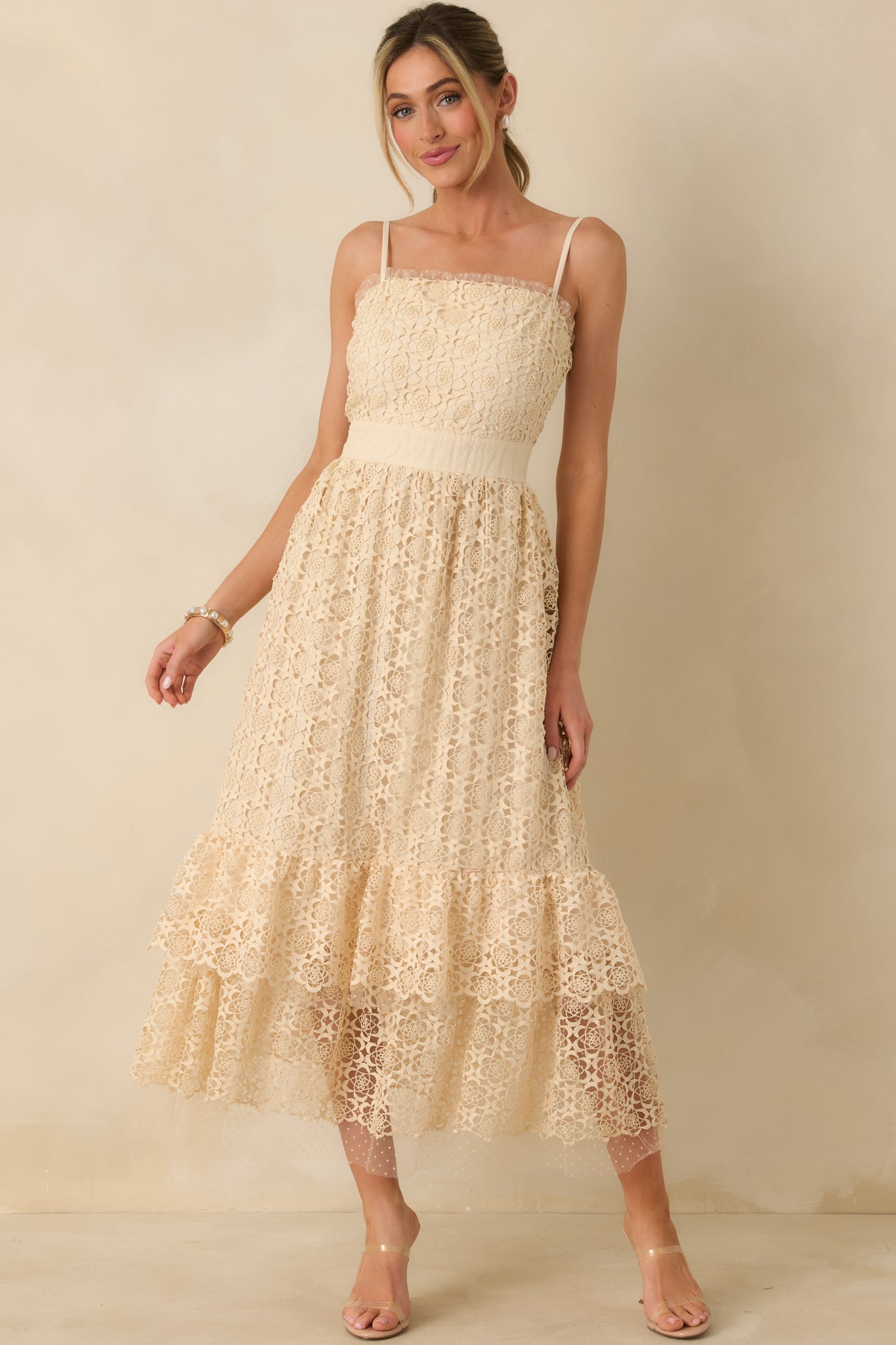 Slightly angled front view showing the thick lace polka dot waistband and tiered bottom hem.