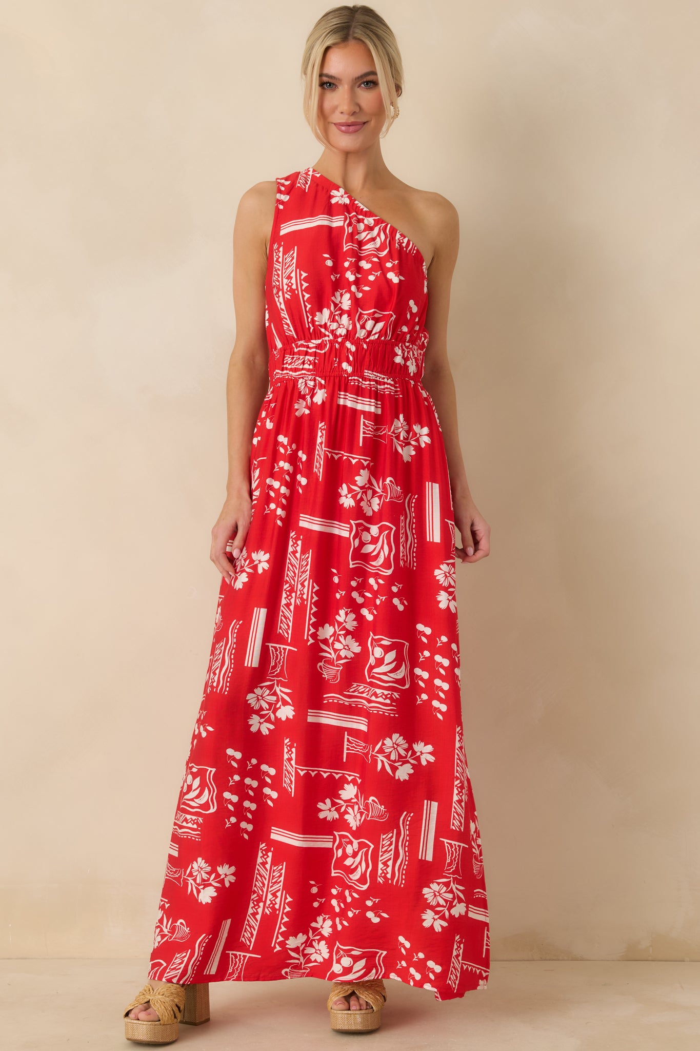 Front-facing view capturing the side slit, printed fabric, and relaxed fit of the dress.