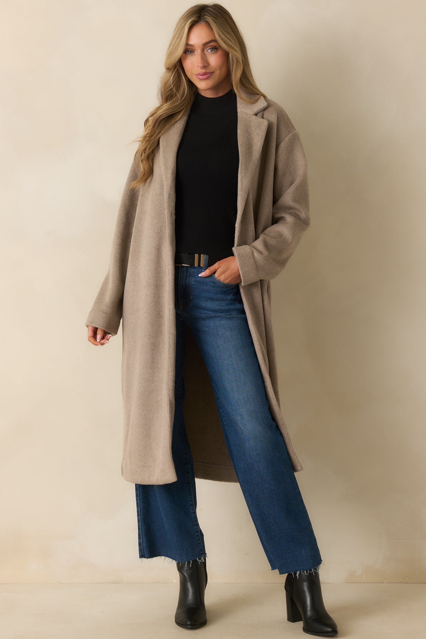 Full body front view highlighting the soft brushed luxe fabric and relaxed longline silhouette.