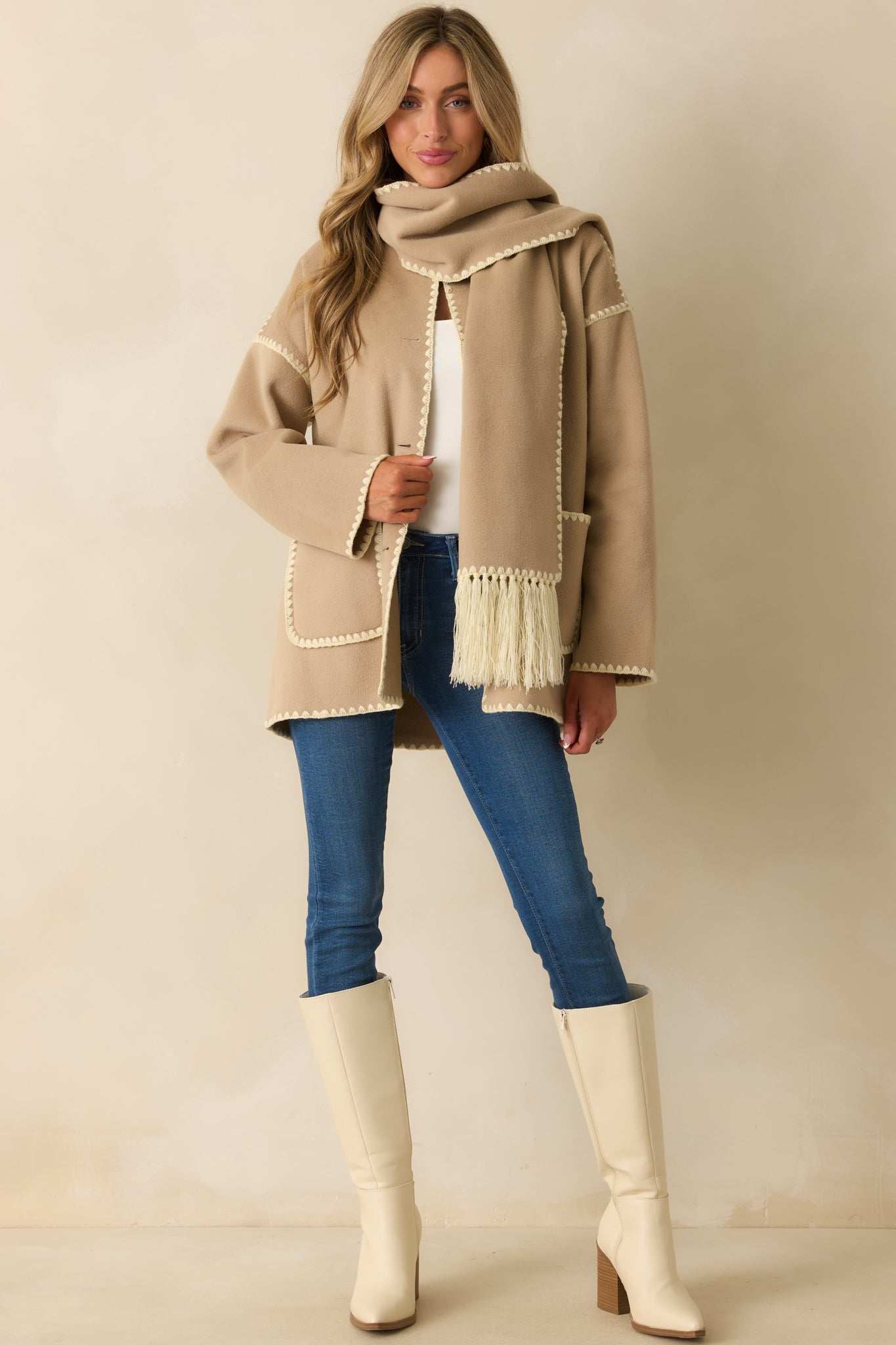 Front view showing the overall fit, long sleeves, and functional button closure.