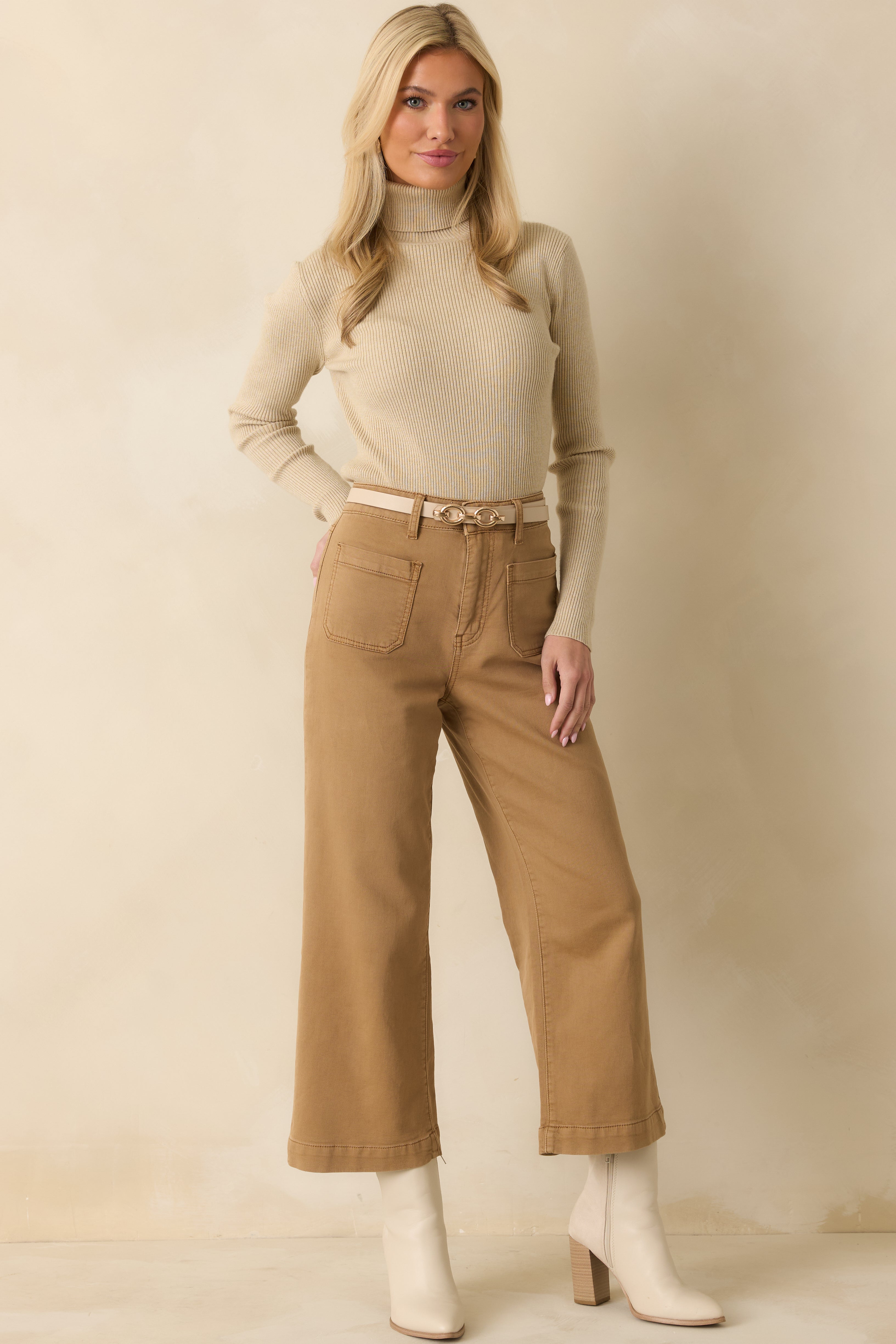 Front-facing view highlighting the slightly relaxed fit and ribbed fabric of the sweater.