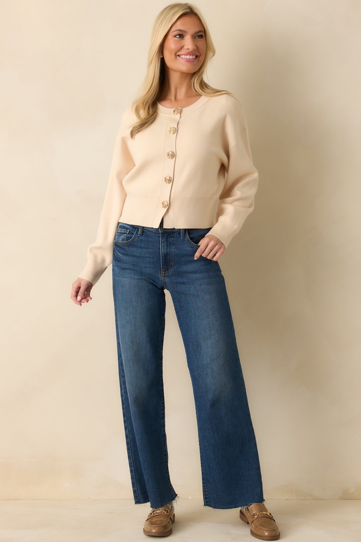 A full body view showing the structured straight leg fit with pockets.