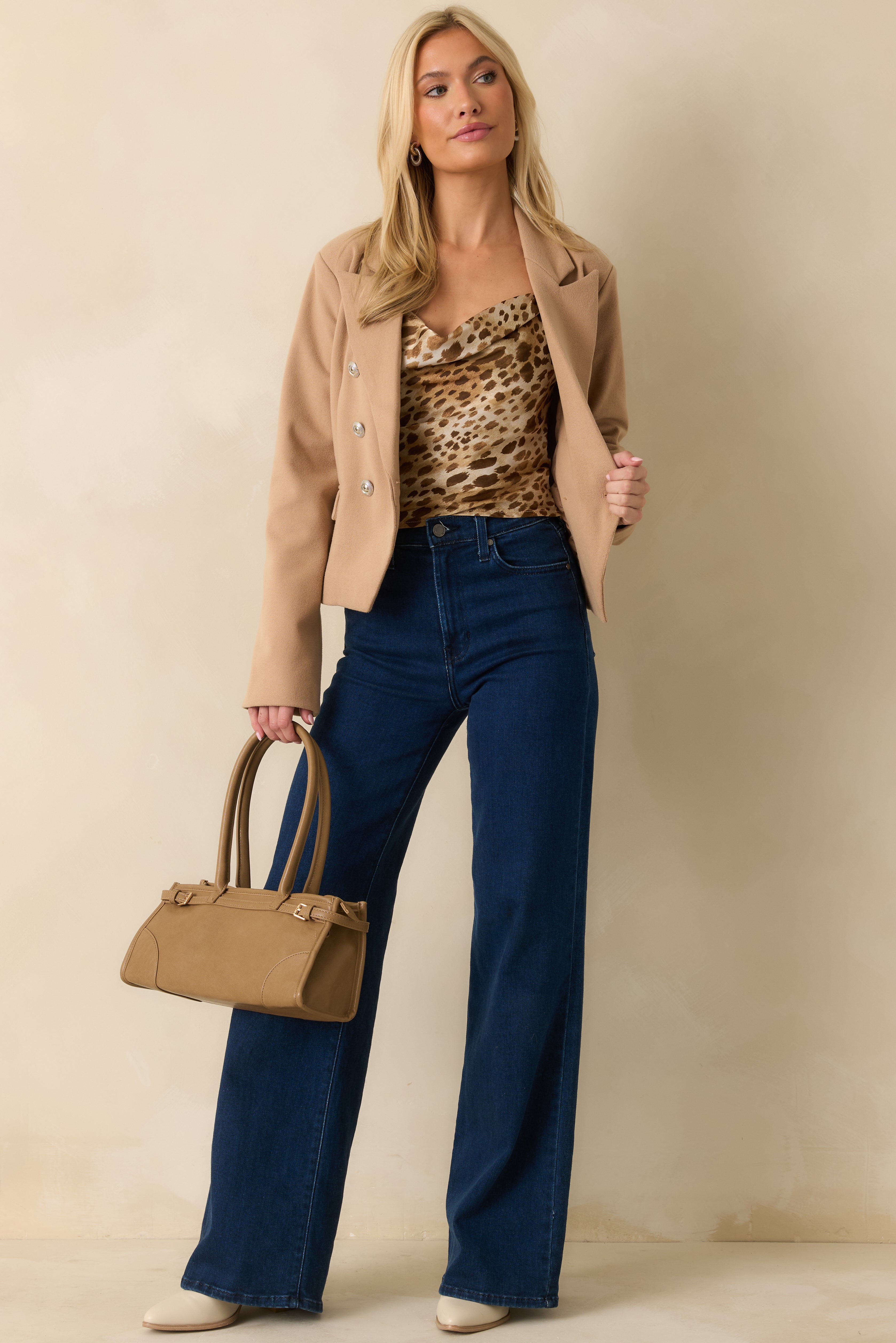 A full front-facing shot emphasizing the structured fit and slightly boxy silhouette.