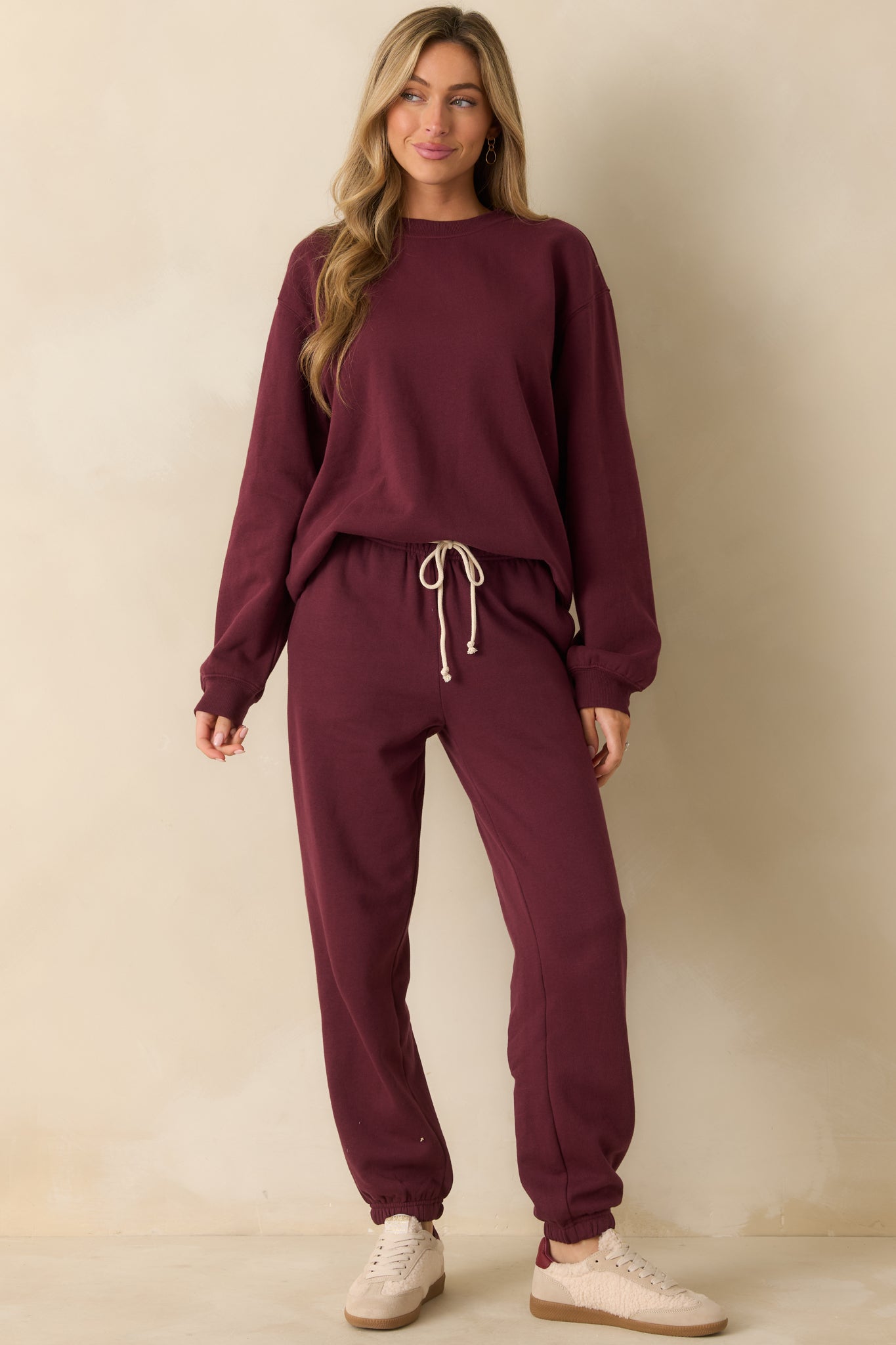 Merlot joggers featuring an elastic drawstring waistband and side pockets for an easygoing, comfy style.