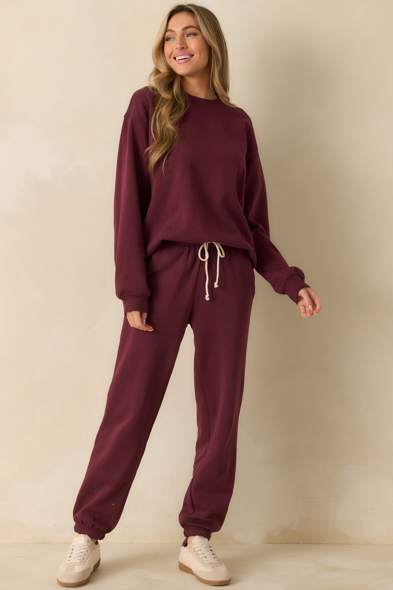 Merlot red sweatshirt with a relaxed fit and classic crew neckline for a laid-back look.