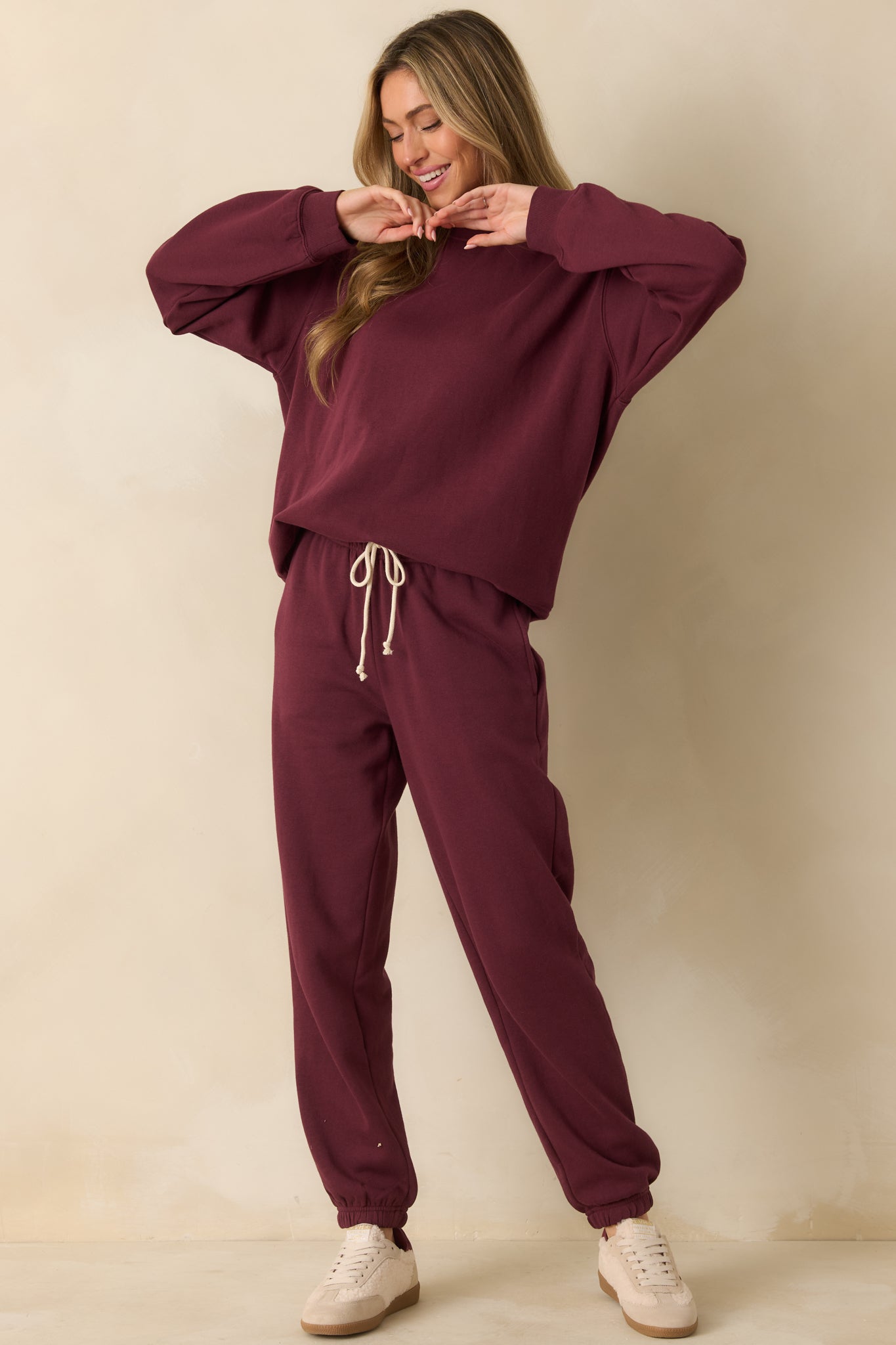 Merlot red fleece sweatshirt with a relaxed fit and classic ribbed trim for everyday comfort.