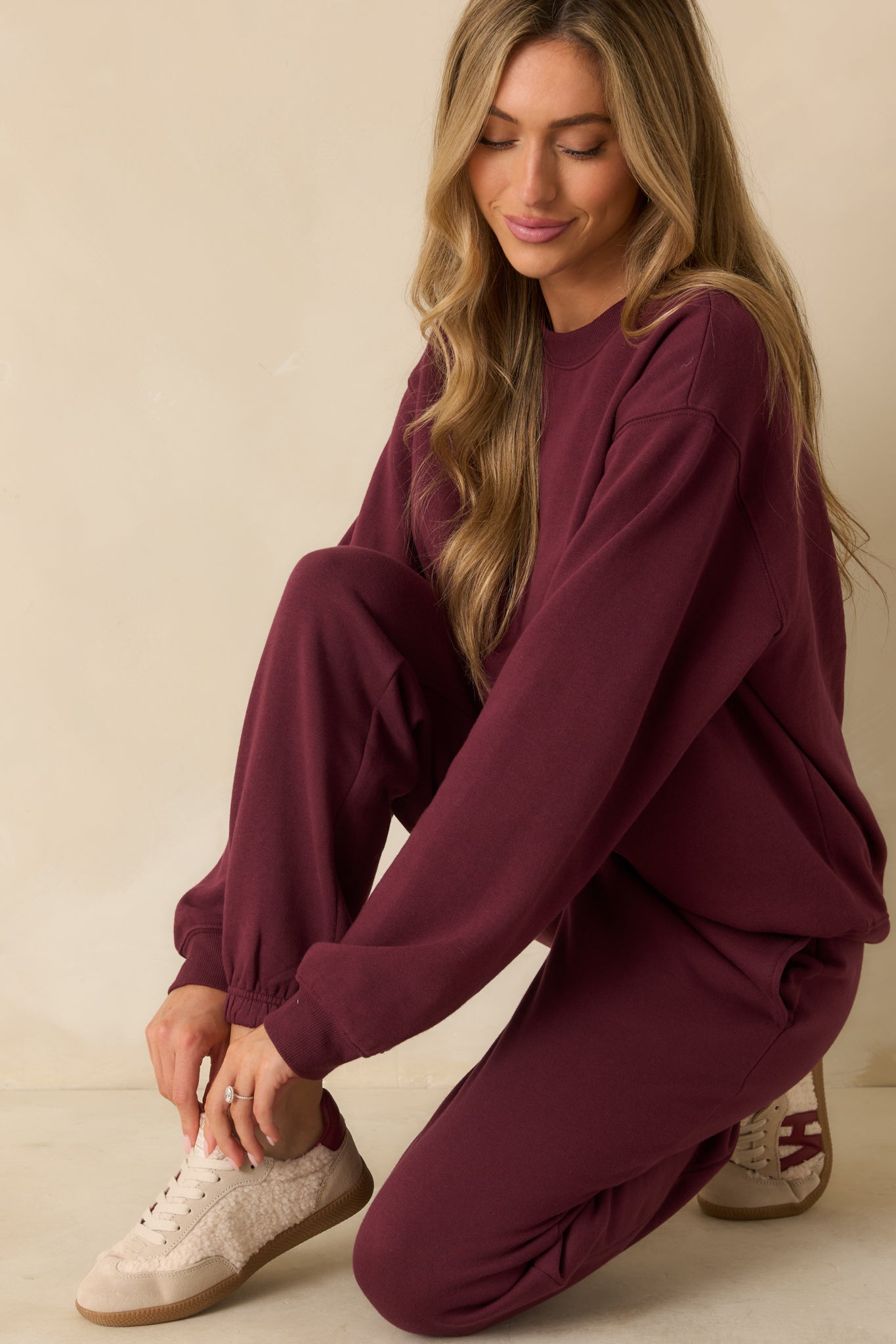 Front view highlighting the ribbed crew neckline and soft fleece fabric of the sweatshirt.
