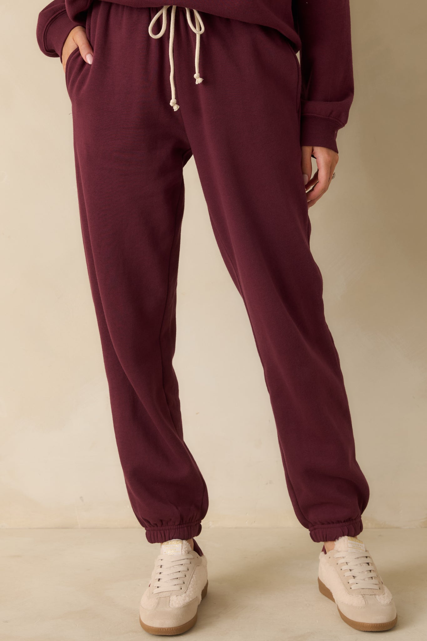 The Z Supply Merlot Stadium Jogger in a soft fleece fabric with a relaxed fit and cinched ankle cuffs.