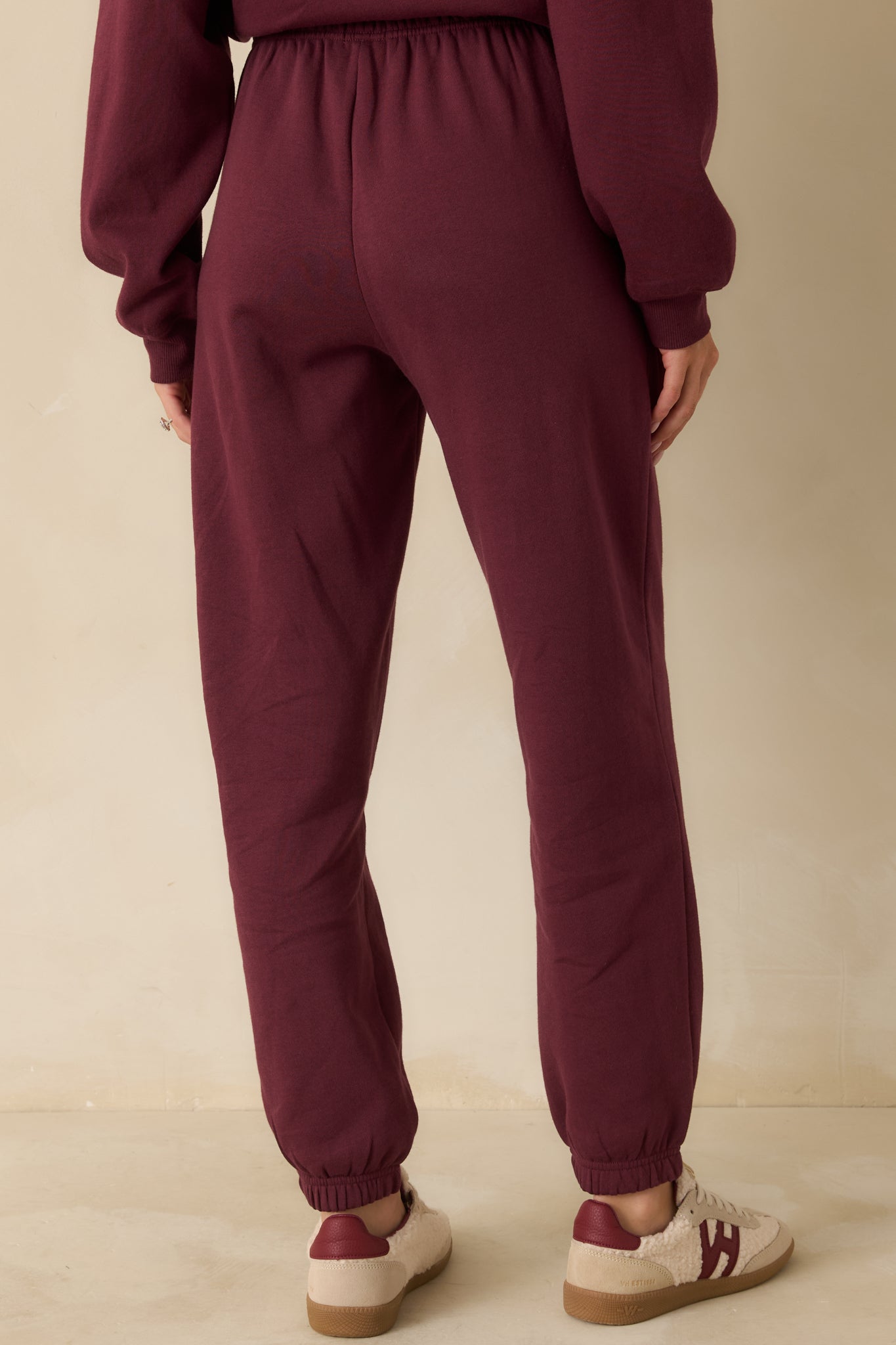 Rear view of the Merlot Stadium Jogger showing the relaxed fit and gathered ankle cuffs.