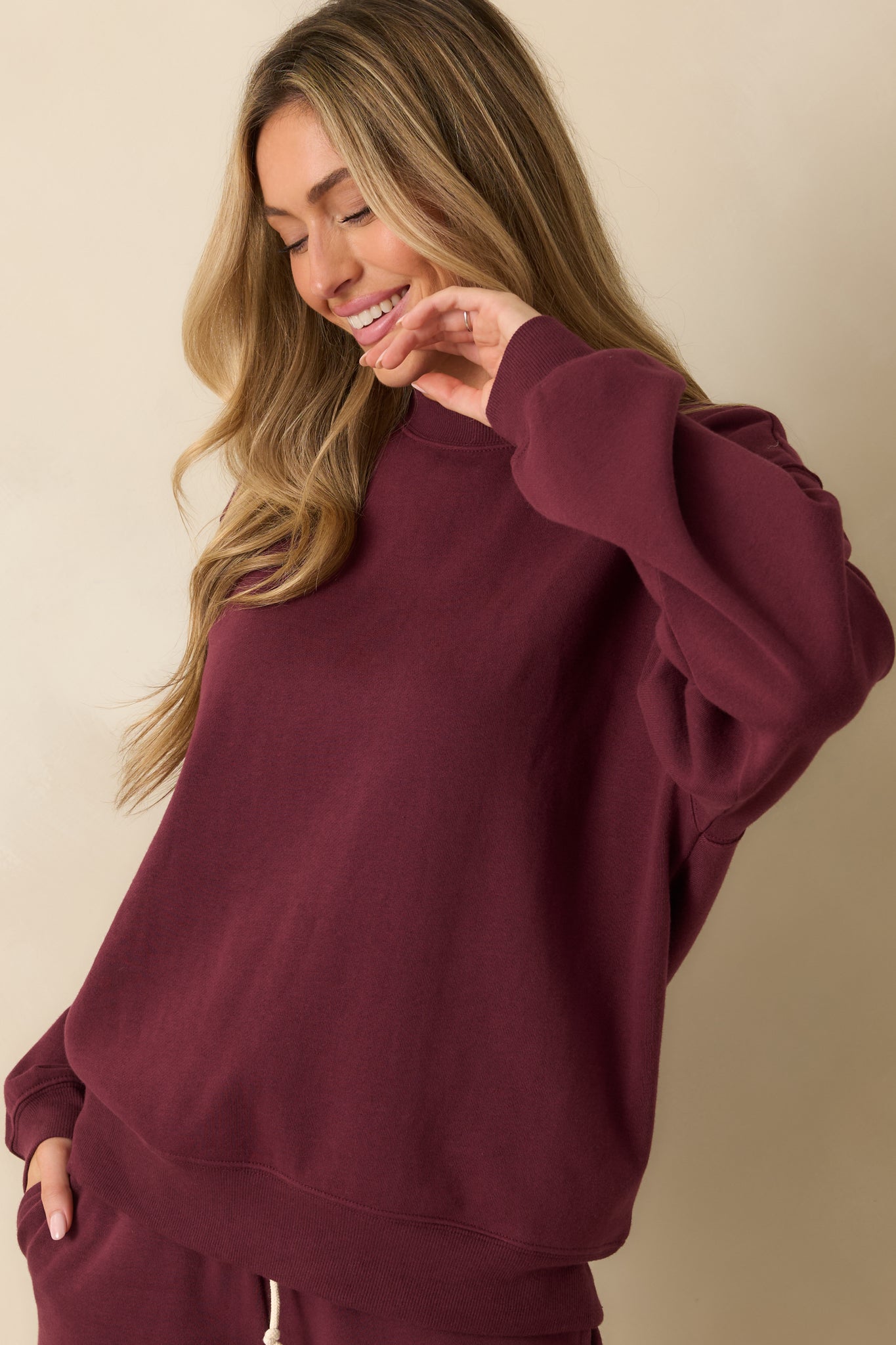 Close view of the ribbed cuffs and hem showing the comfortable, relaxed structure.