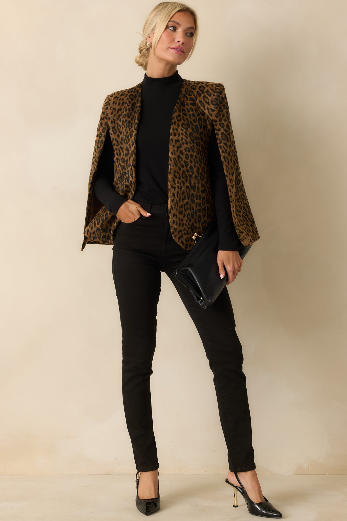 Full-length blazer showcasing a slightly fuzzy texture and structured, elevated silhouette.