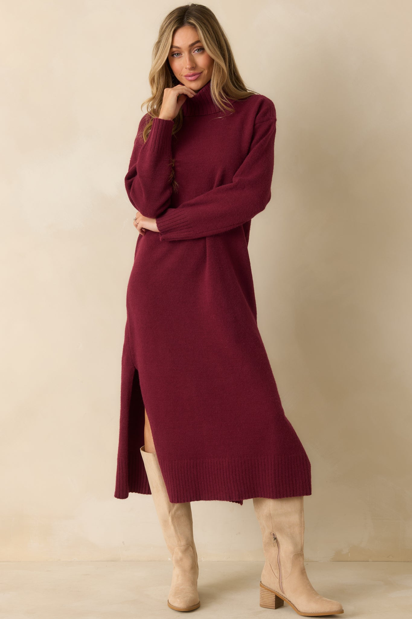Cozy turtleneck dress designed with a slim fit and comfortable knit texture.