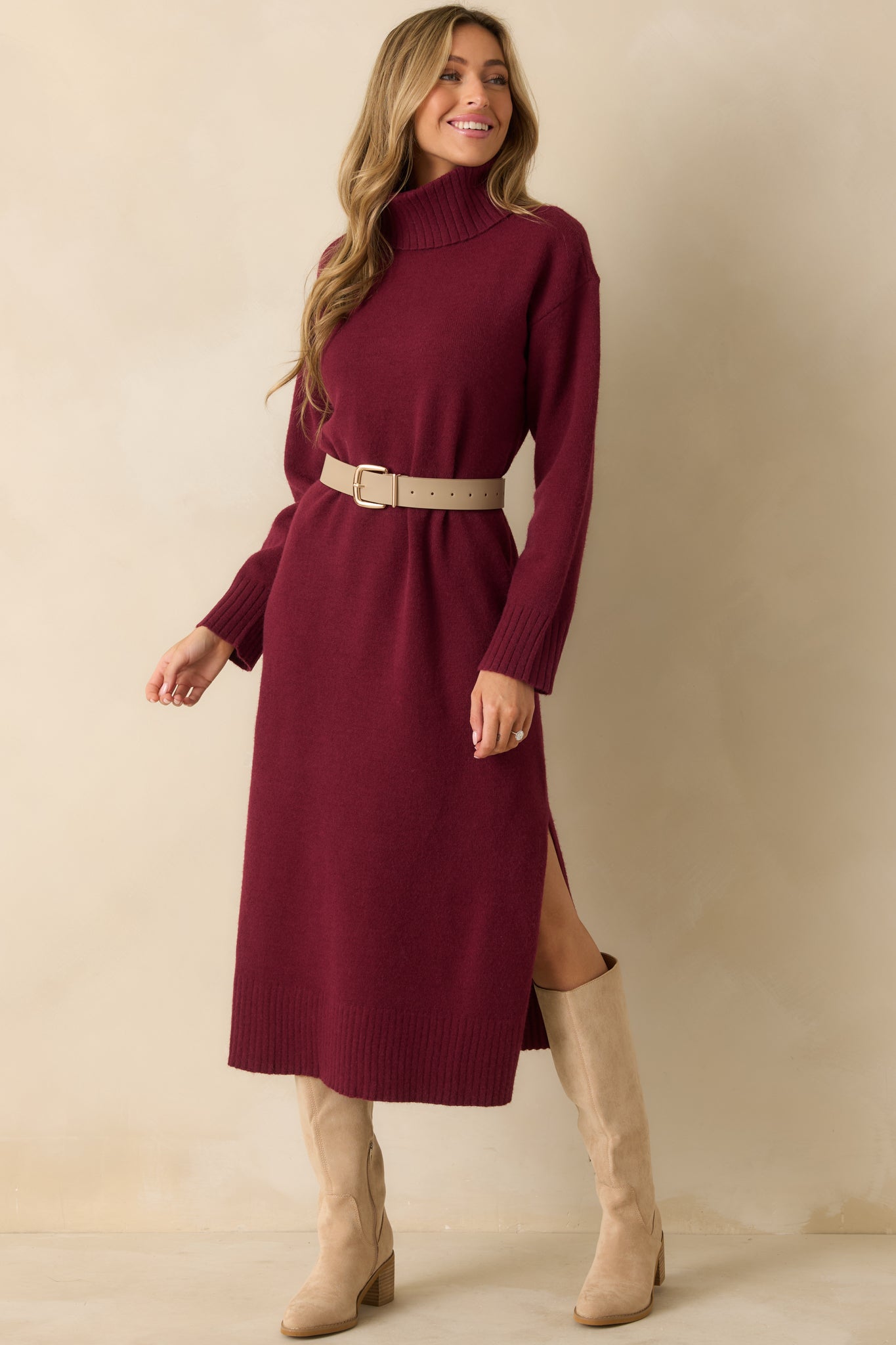 Soft burgundy sweater dress with ribbed cuffs and hem for a polished, cozy look.