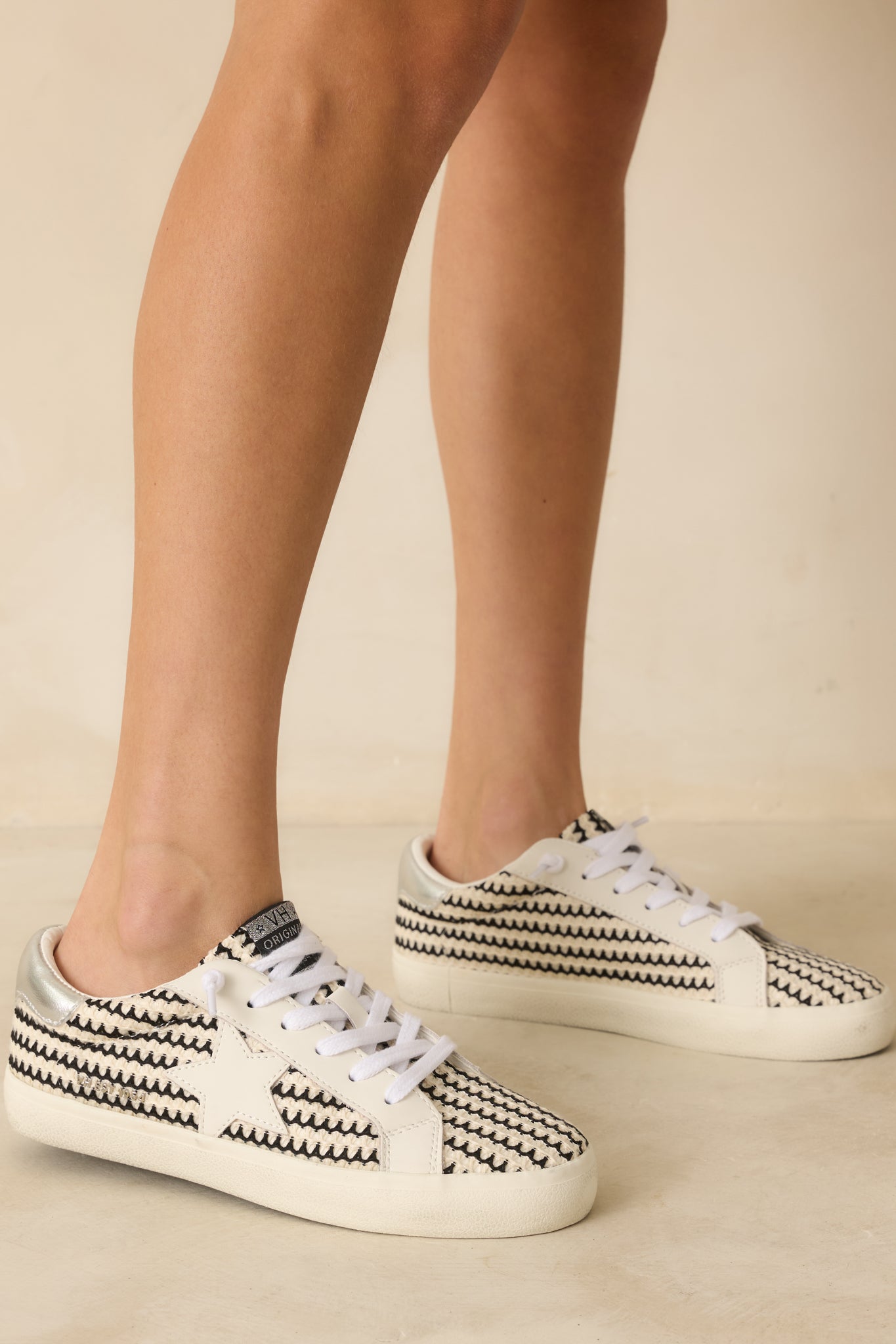 Side angle showing the rounded toe, structured upper, and lace closure.