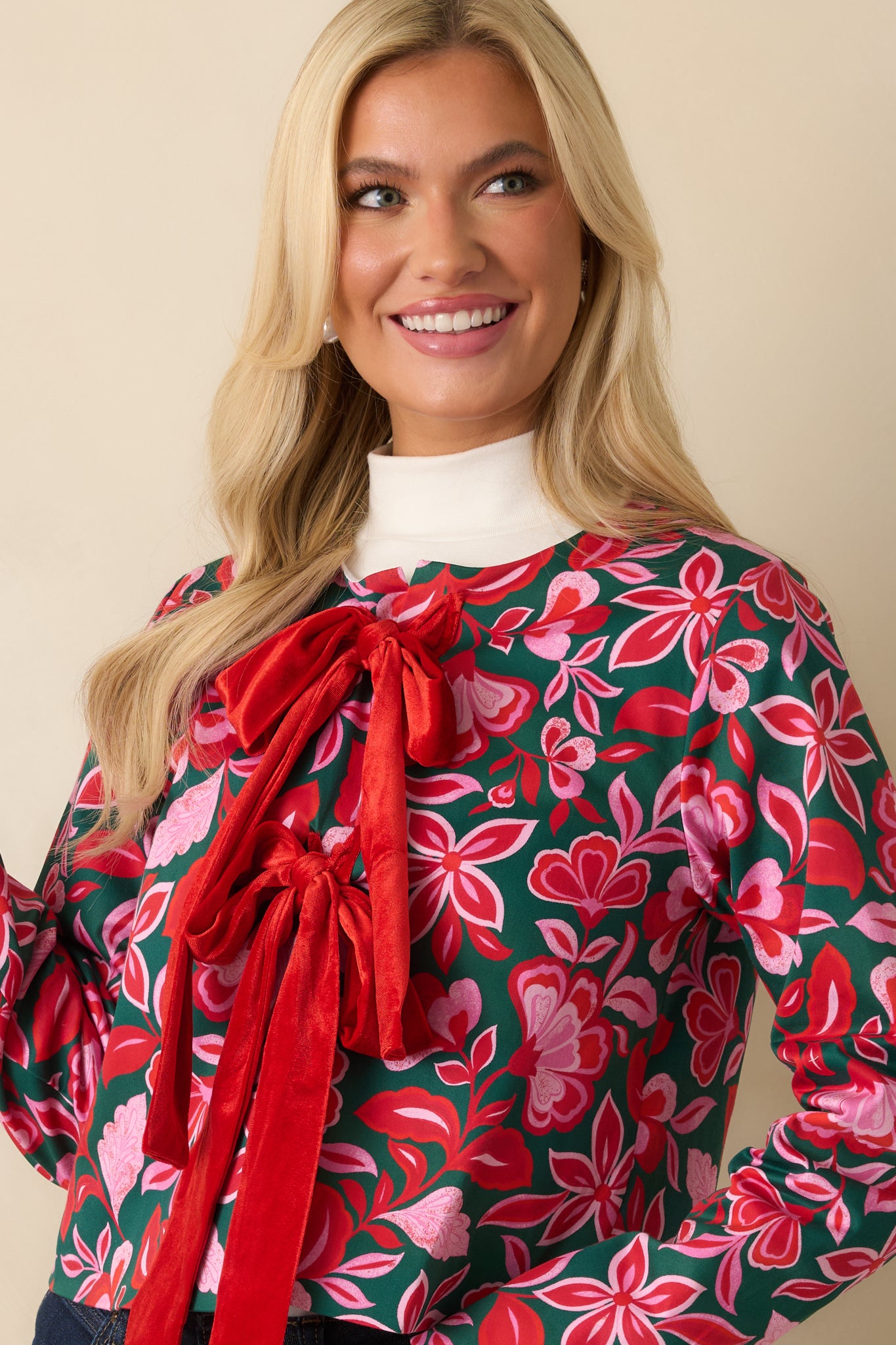 The sleeve and cuff reveal the long sleeve shape and printed cotton fabric texture.