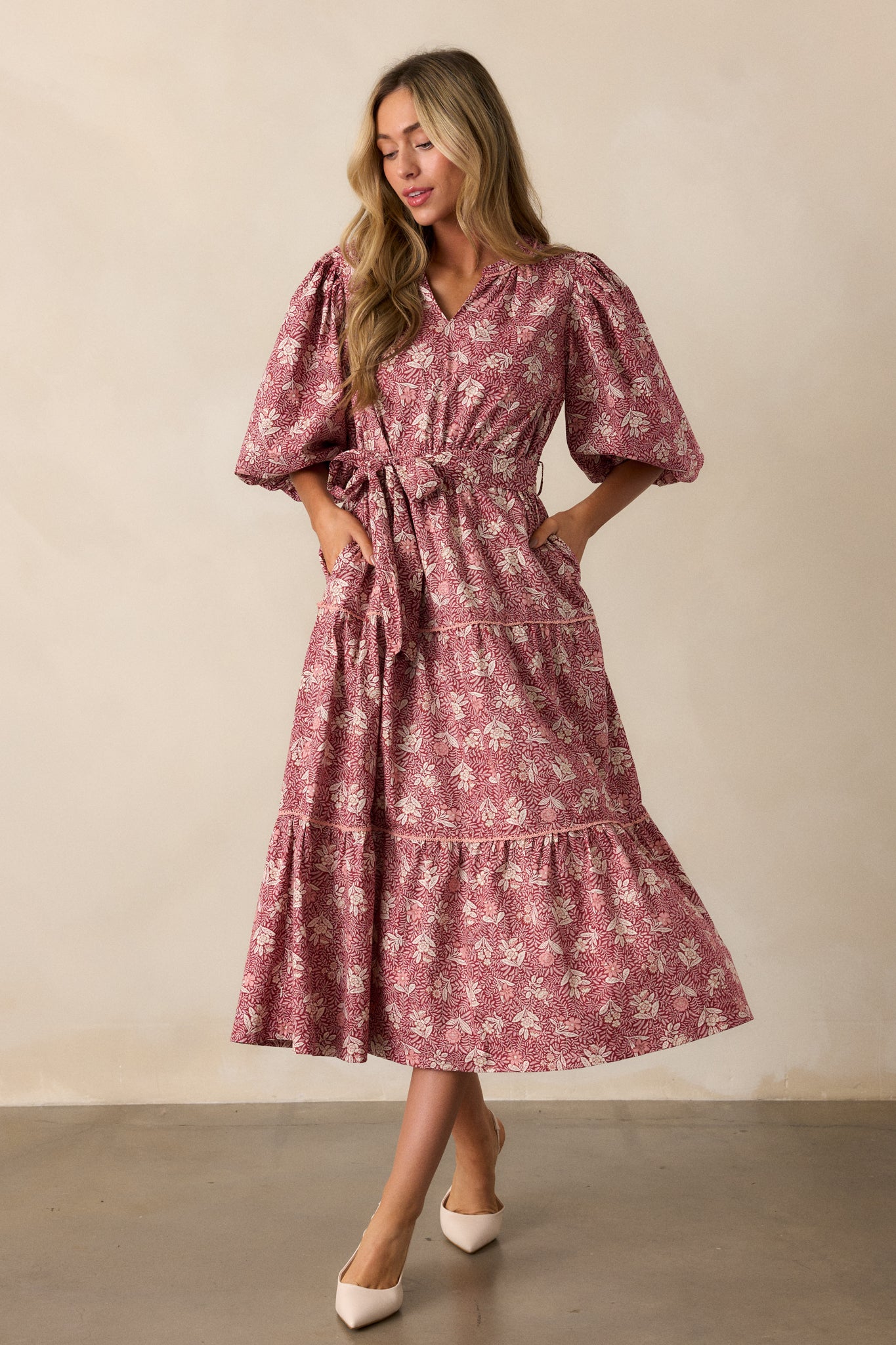 Full body image emphasizing the optional self-tie belt cinching the waist and accentuating the dress's flowing silhouette.