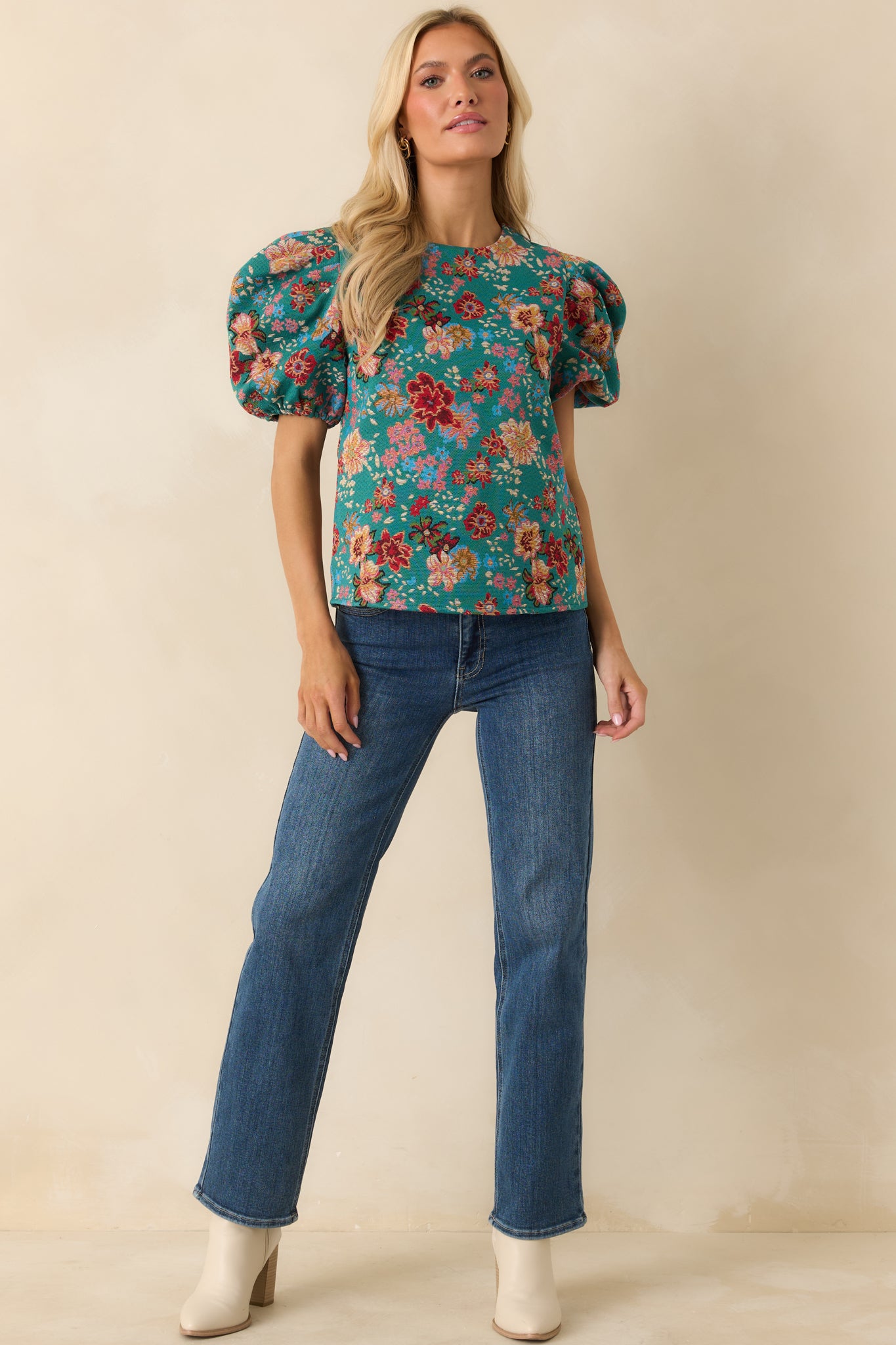 Woven teal-green top with a relaxed yet tailored shape, puff sleeves, and crew neckline.