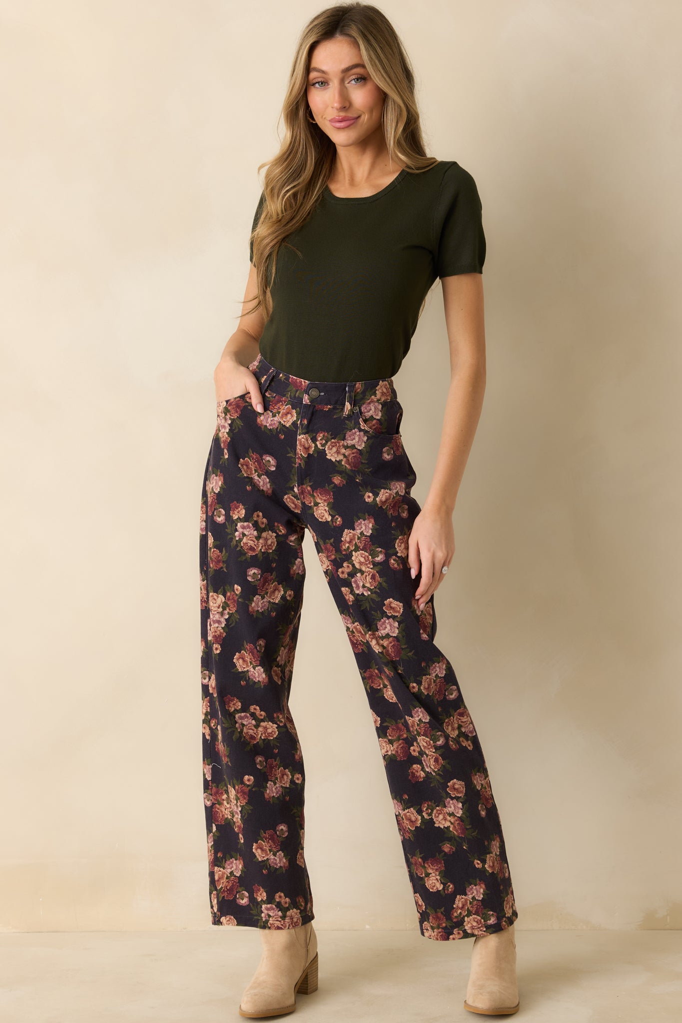 Short sleeve sweater top in deep green showing off its clean lines and comfortable, lightweight knit.