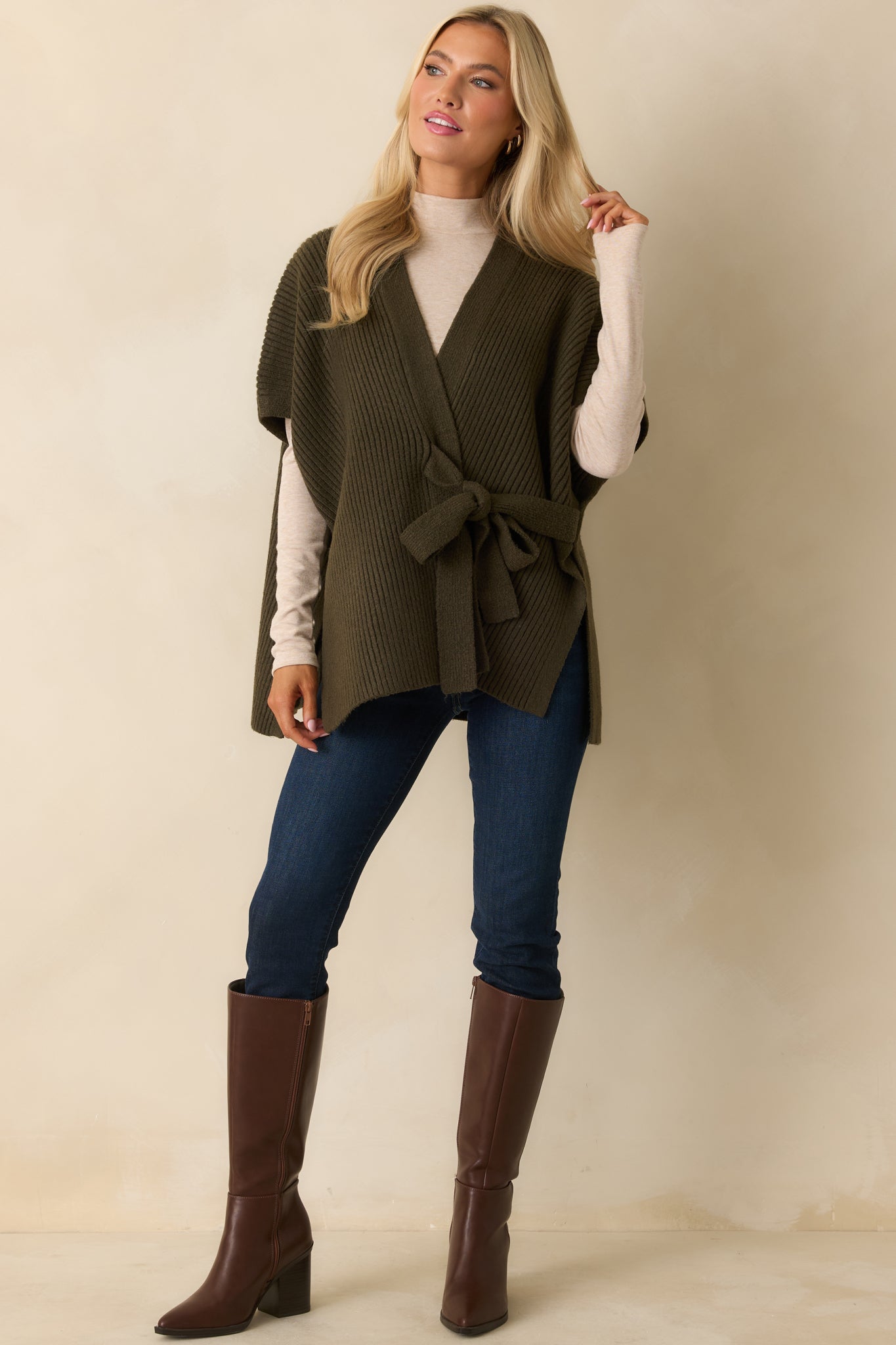 Front view of olive cardigan highlighting soft midweight ribbed fabric and cozy, elevated design.
