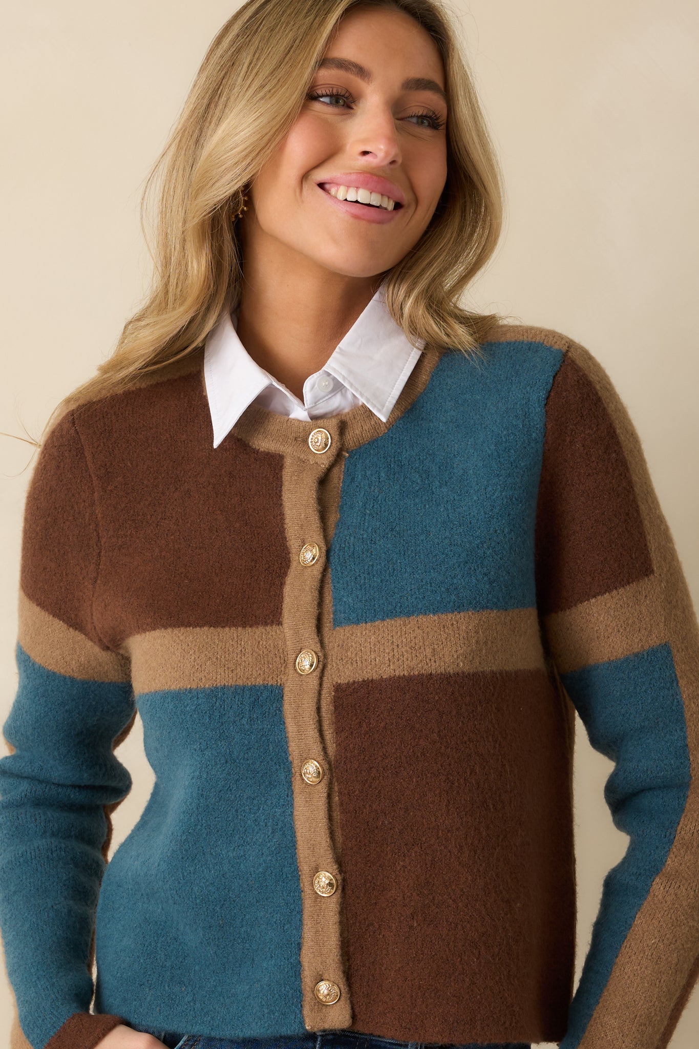 Cropped detail showcasing long sleeves with subtle shaping and soft midweight texture.