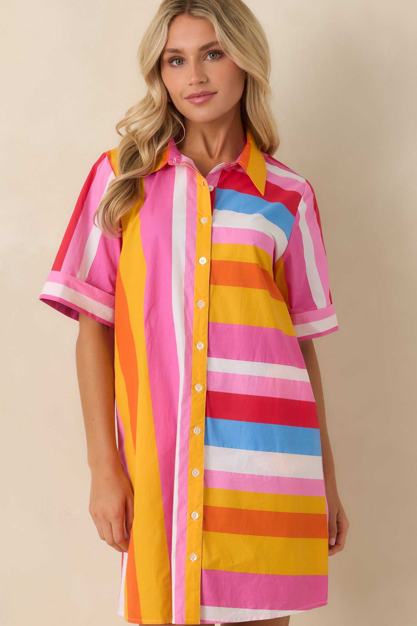 Striped cotton shirt dress featuring side pocket detail and breathable summer-ready material.