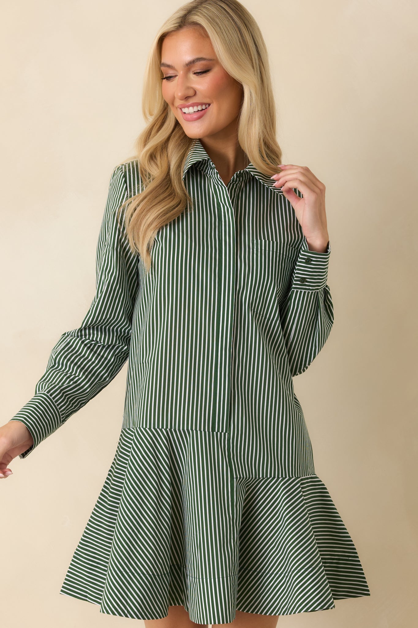 Cropped view highlighting the drop waist seam and the start of the flounced A-line skirt.