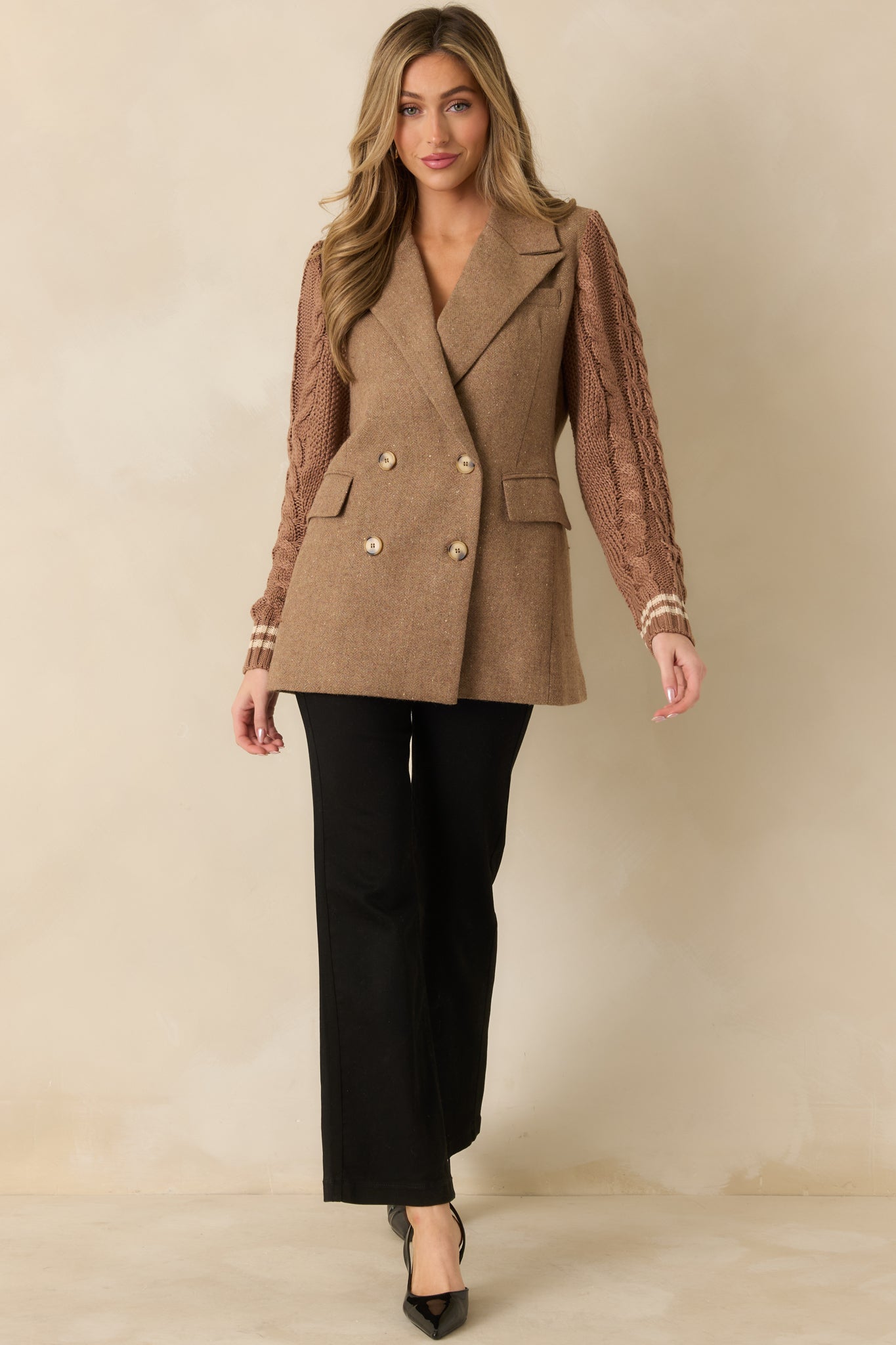 Camel wool-blend blazer featuring a structured double-breasted front and sharp notched lapels.