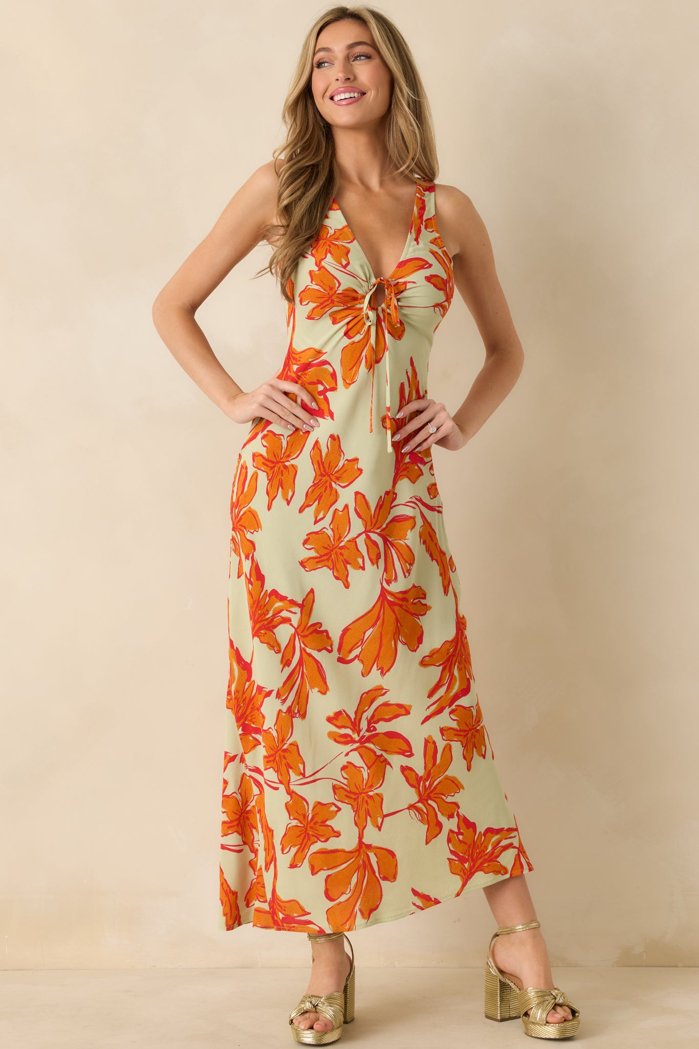 Front view of the floral maxi dress showcasing the V-neck and relaxed length.