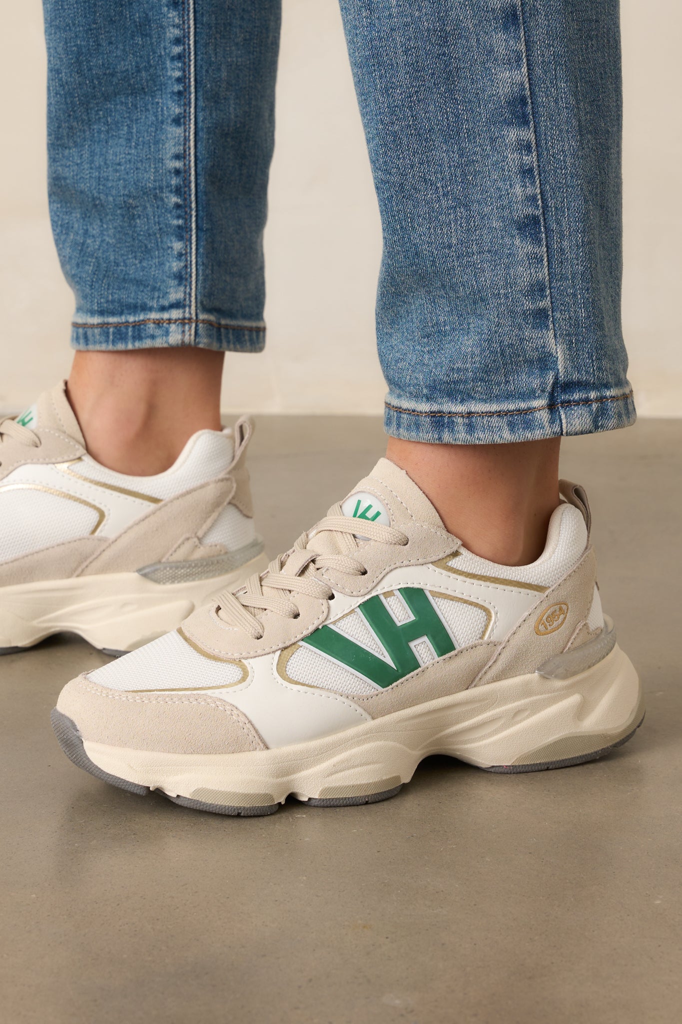 Close-up of the VH logo and upper panels with visible stitching and color-blocked design.