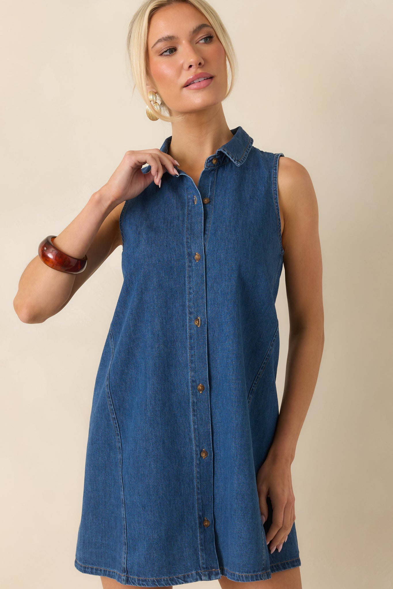 Cropped angle showcasing the side pocket placement and relaxed shaping through the waist and hip area.