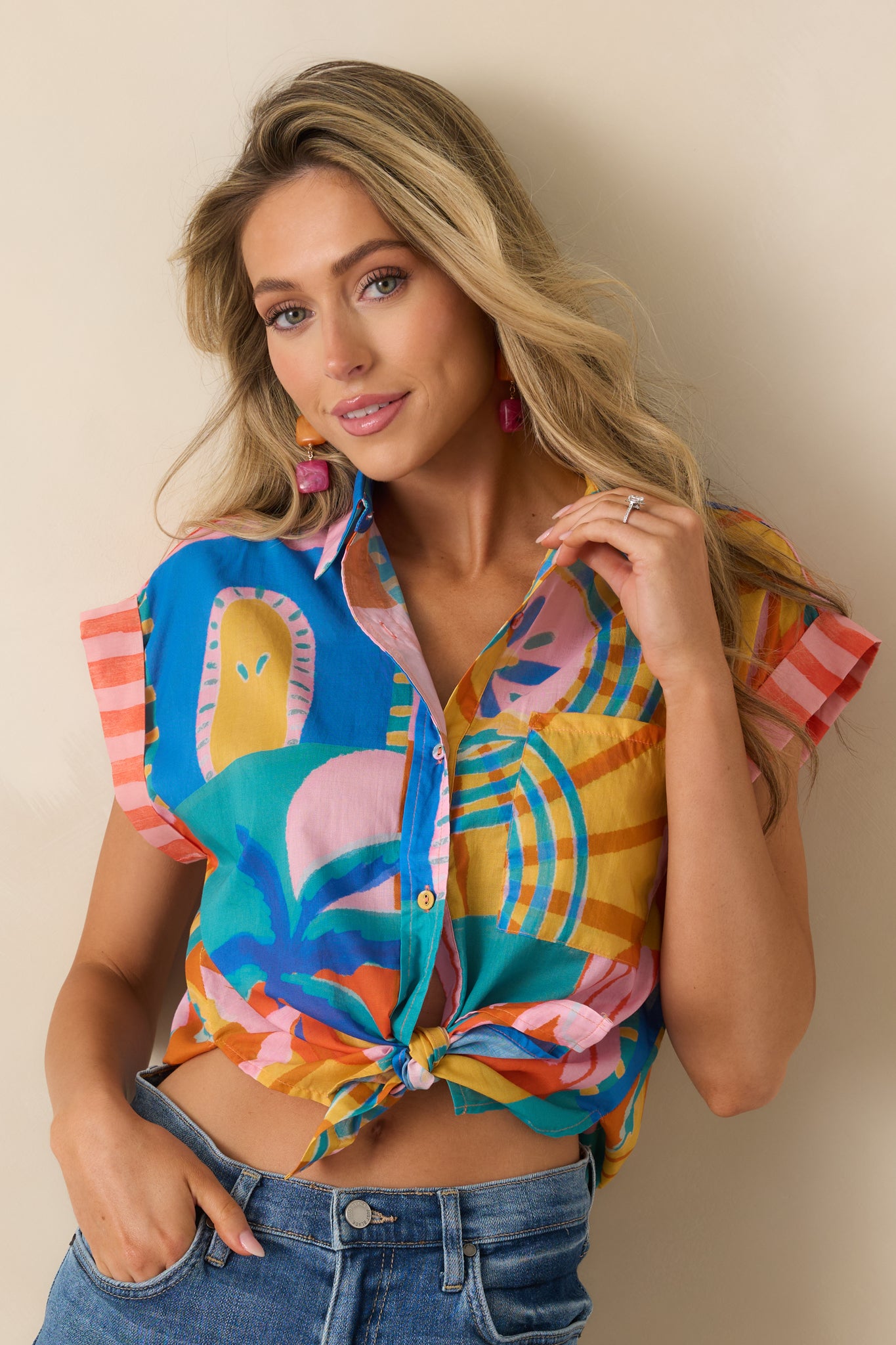 Cropped view highlighting the vibrant mosaic print and soft cotton texture of the relaxed shirt.