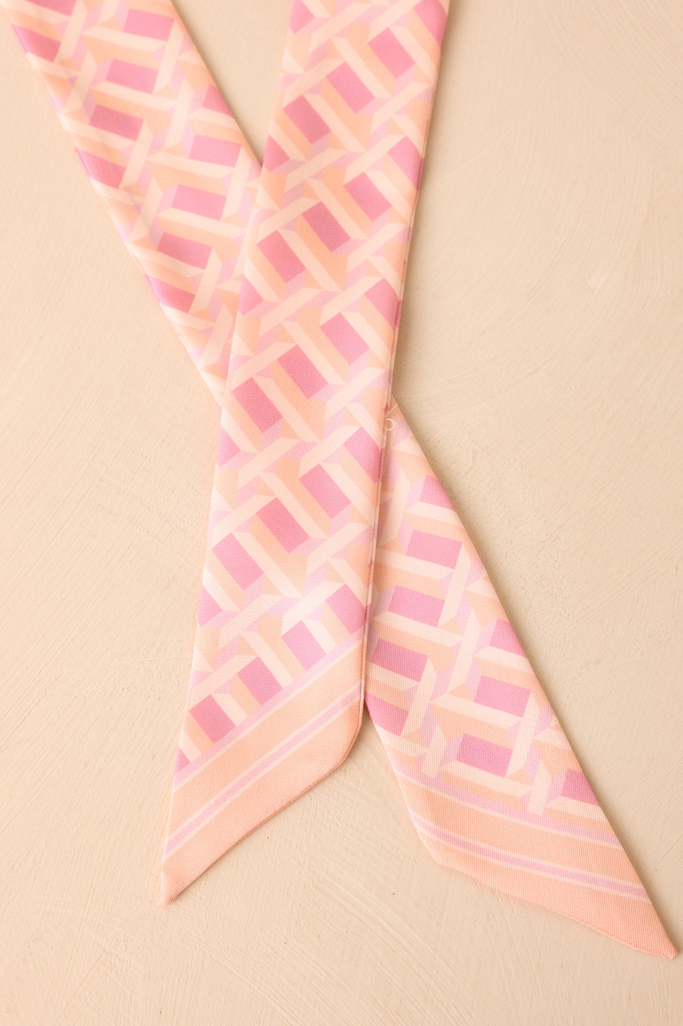 Close up of the geometric blush, pink & ivory print.